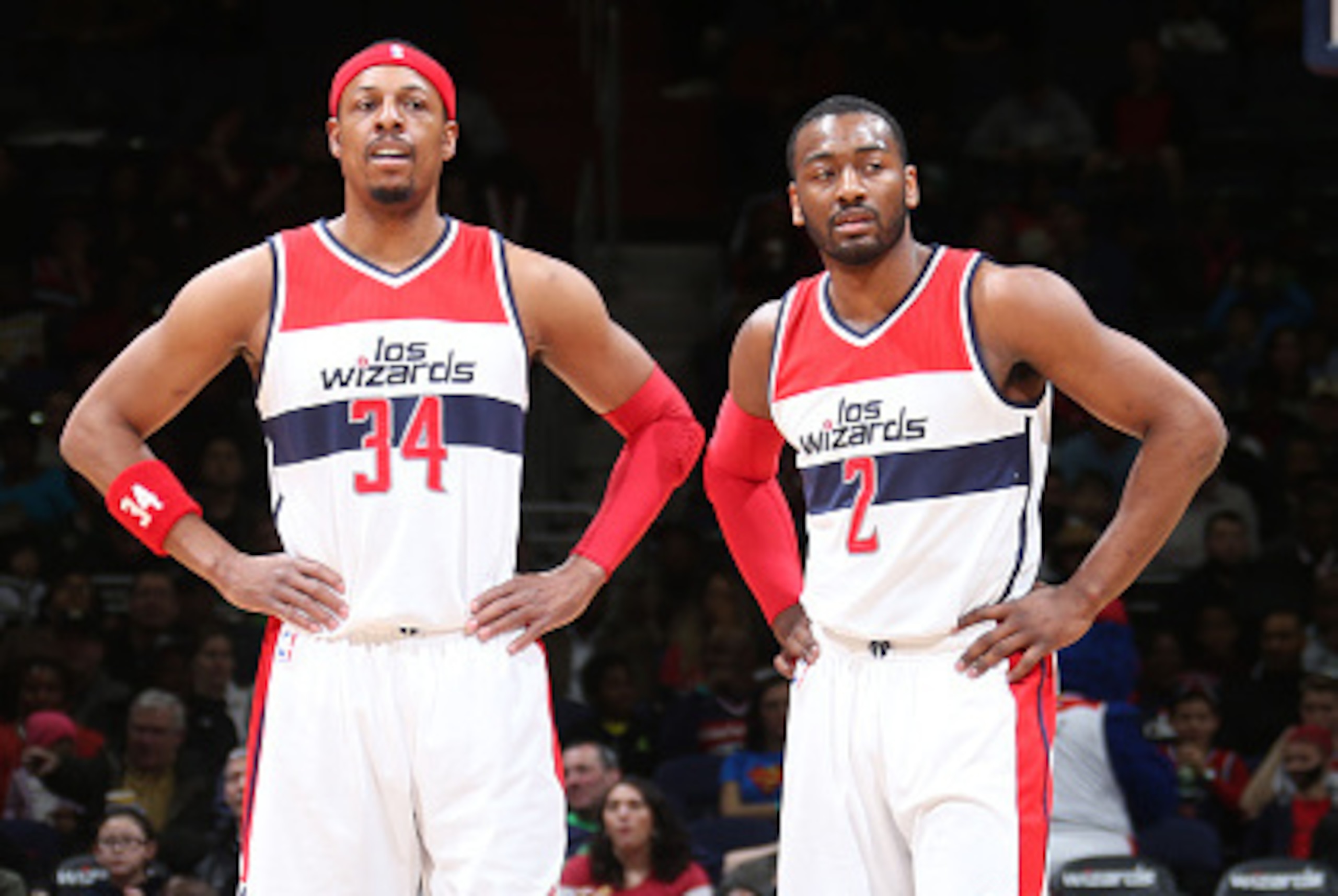 WASHINGTON, DC - MARCH 29: Paul Pierce #34 and John Wall #2 of the Washington Wizards during the game against the Houston Rockets at the Verizon Center on March 29, 2015 in Washington, DC. NOTE TO USER: User expressly acknowledges and agrees that, by down