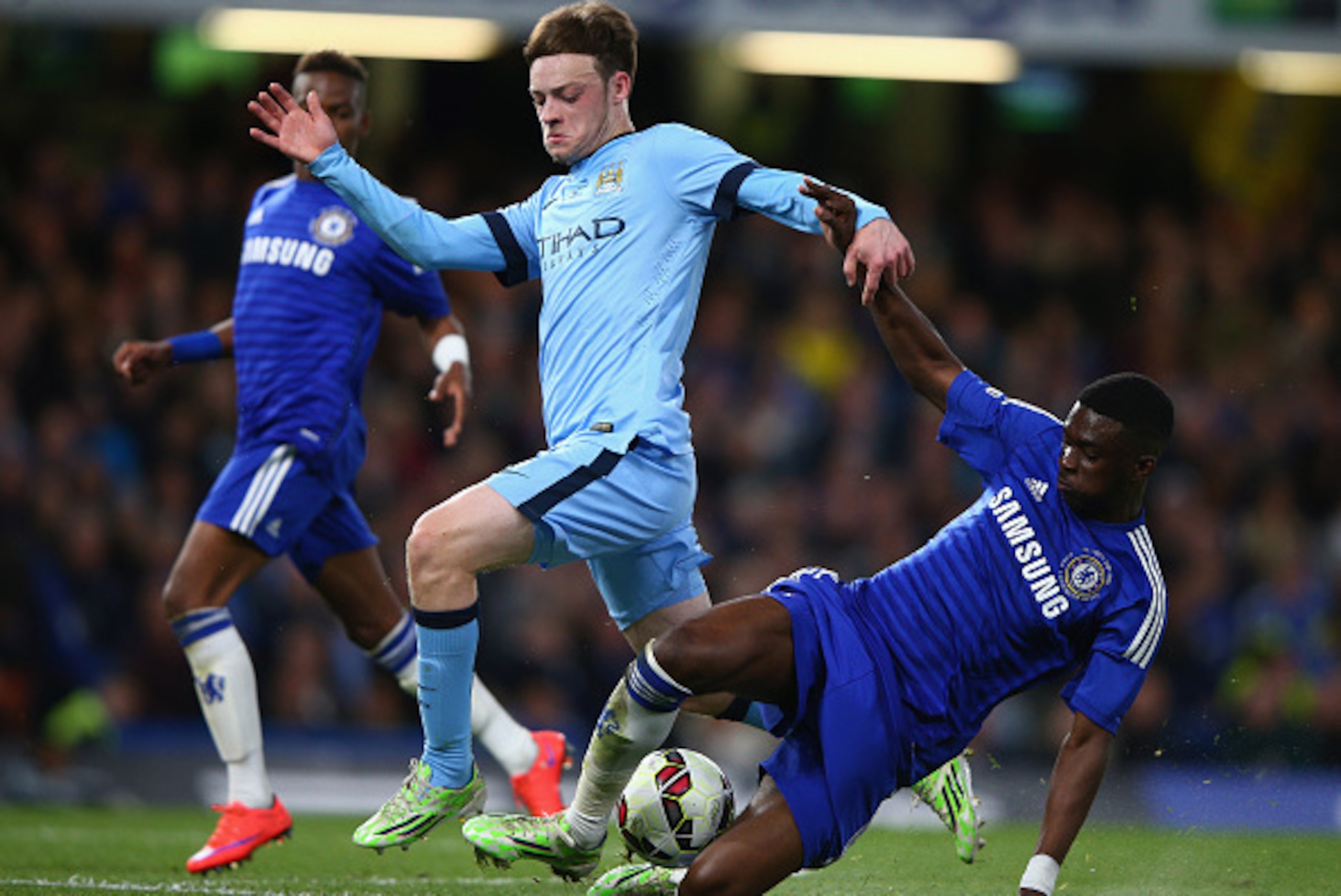 LONDON, ENGLAND - APRIL 27:  Brandon Barker of  Manchester City is Tackled by Fikayo Tomori of Chelsea during the FA Youth Cup Fina, Second Leg match between Chelsea and Manchester City at Stamford Bridge on April 27, 2015 in London, England.  (Photo by I