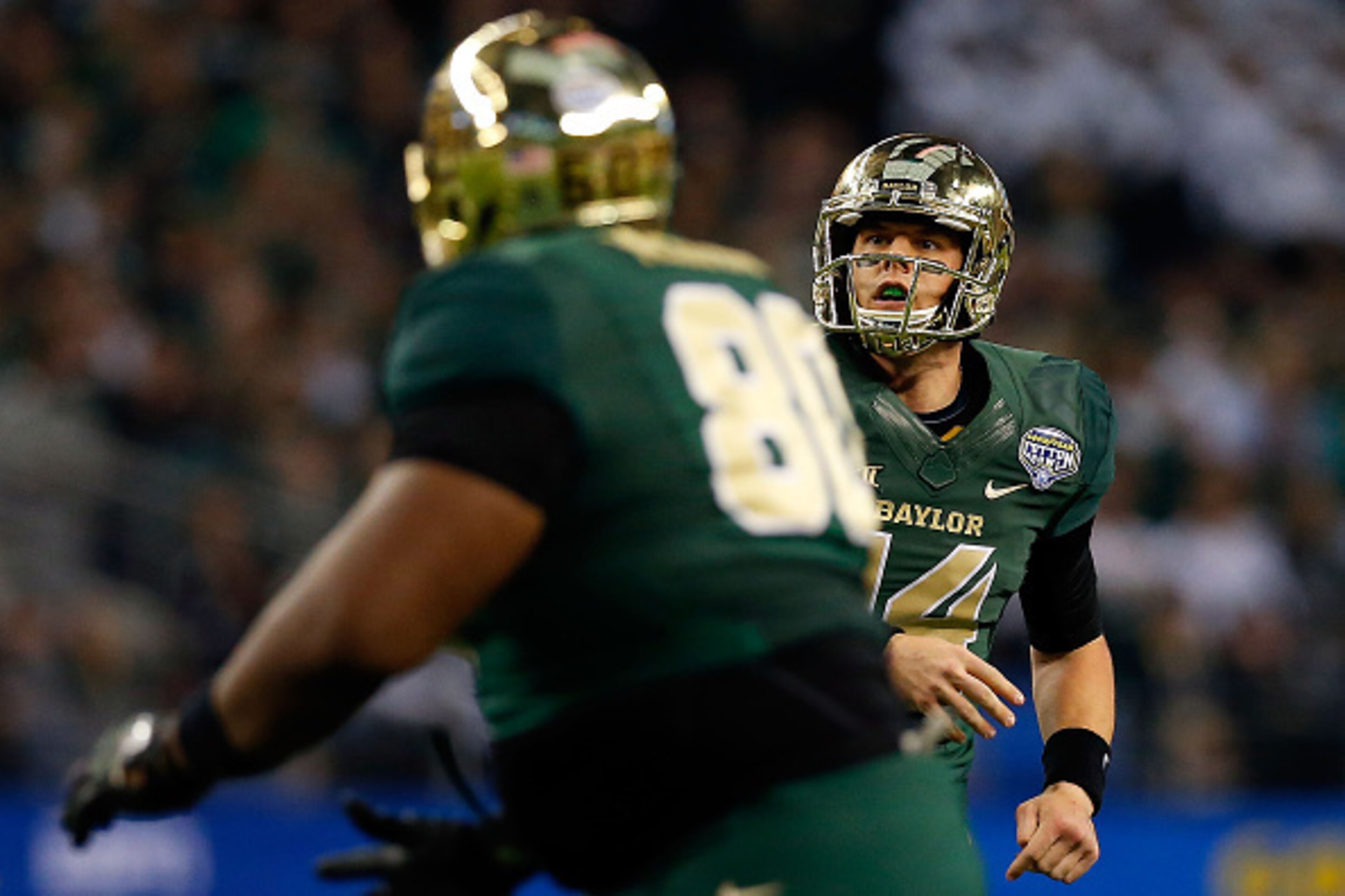 ARLINGTON, TX - JANUARY 01: Bryce Petty #14 of the Baylor Bears passes to LaQuan McGowan #80 of the Baylor Bears for a touchdown against the Michigan State Spartans during the second half of the Goodyear Cotton Bowl Classic at AT&T Stadium on January 1, ARLINGTON, TX - JANUARY 01: Bryce Petty #14 of the Baylor Bears passes to LaQuan McGowan #80 of the Baylor Bears for a touchdown against the Michigan State Spartans during the second half of the Goodyear Cotton Bowl Classic at AT&T Stadium on January 1,
