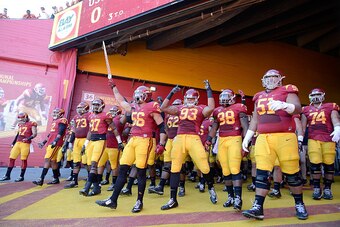 LOS ANGELES, CA - NOVEMBER 29:  The USC Trojans take to the field before the game agaisnt the Notre Dame Fighting Irish at Los Angeles Memorial Coliseum on November 29, 2014 in Los Angeles, California.  (Photo by Harry How/Getty Images)