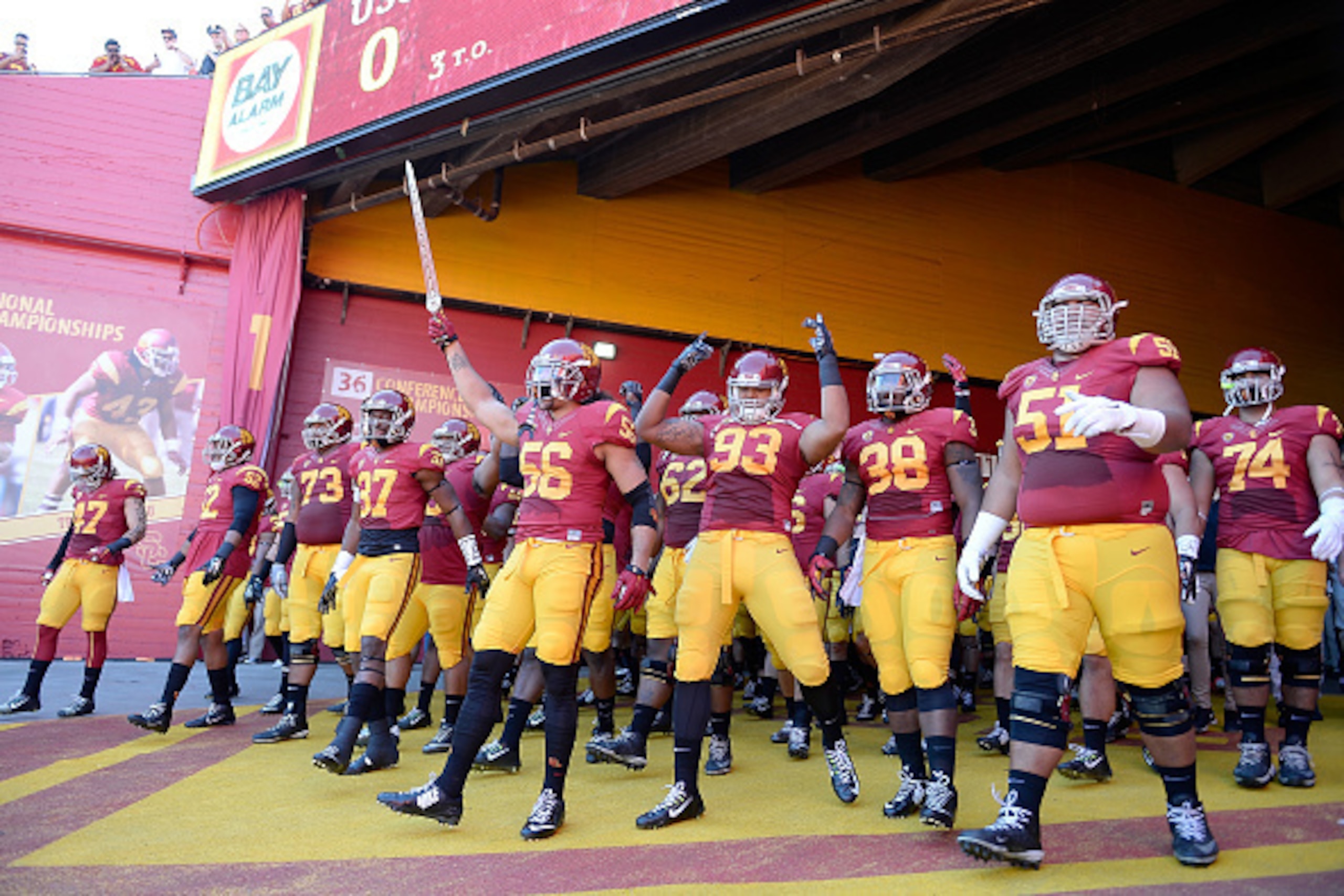 LOS ANGELES, CA - NOVEMBER 29:  The USC Trojans take to the field before the game agaisnt the Notre Dame Fighting Irish at Los Angeles Memorial Coliseum on November 29, 2014 in Los Angeles, California.  (Photo by Harry How/Getty Images)