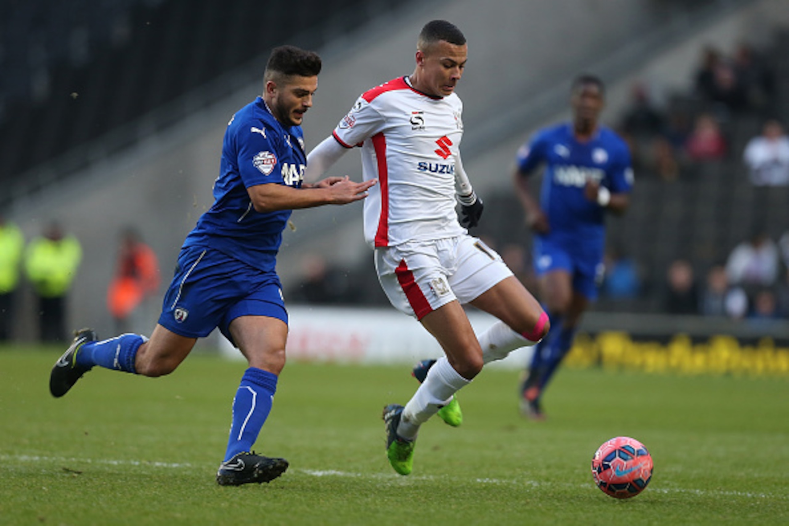 MILTON KEYNES, ENGLAND - DECEMBER 06: Dele Alli of MK Dons looks to the ball with Sam Morsy of Chesterfield during the FA Cup Second Round match between MK Dons and Chesterfield at Stadium mk on December 6, 2014 in Milton Keynes, England. (Photo by Pete MILTON KEYNES, ENGLAND - DECEMBER 06: Dele Alli of MK Dons looks to the ball with Sam Morsy of Chesterfield during the FA Cup Second Round match between MK Dons and Chesterfield at Stadium mk on December 6, 2014 in Milton Keynes, England. (Photo by Pete