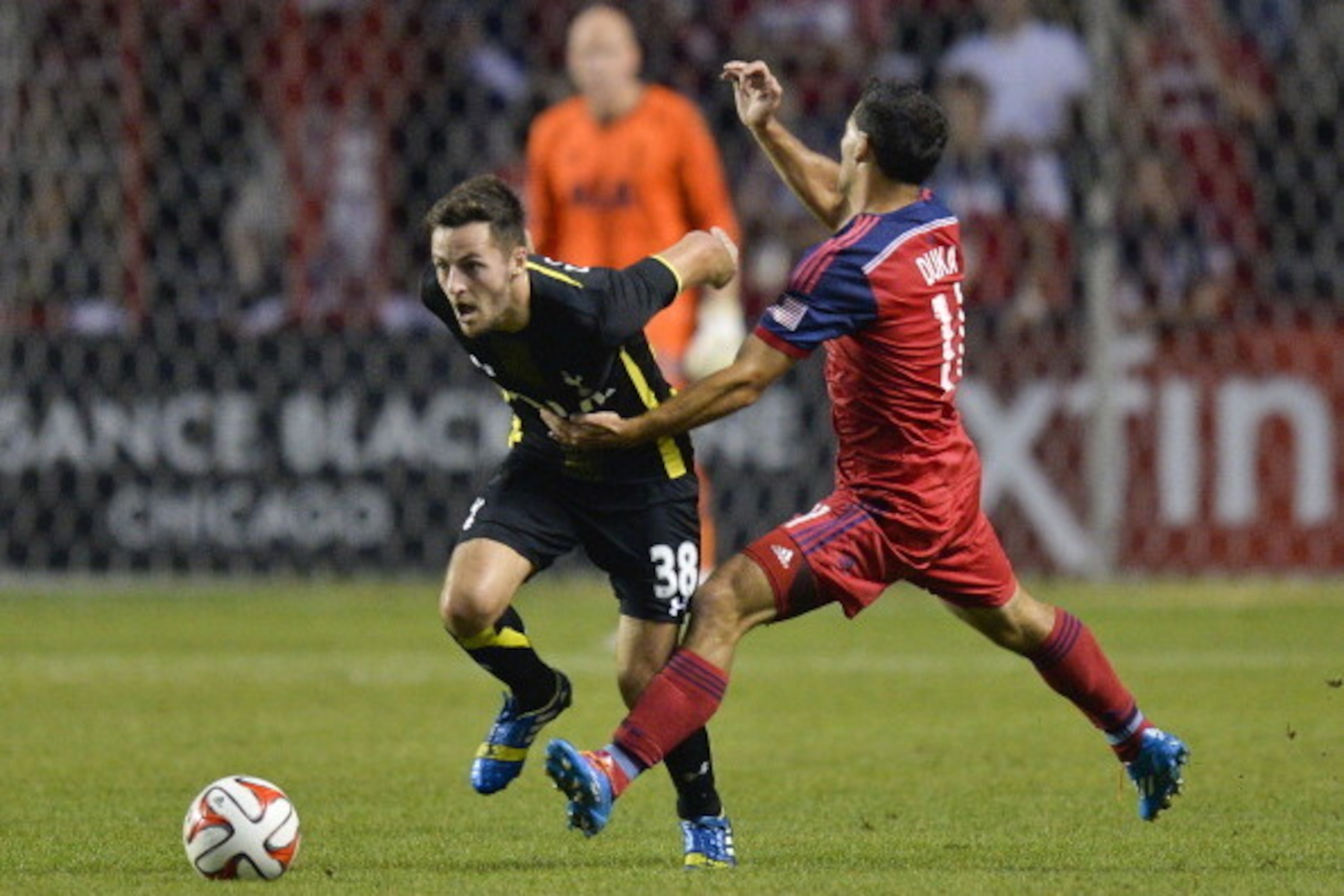 BRIDGEVIEW, IL - JULY 26: Dilly Duka #11 of Chicago Fire (R) trips Ryan Mason #38 of Tottenham Hotspur during the second half at Toyota Park on July 26, 2014 in Bridgeview, Illinois. Tottenham Hotspur defeated the Fire 2-0. (Photo by Brian Kersey/Getty BRIDGEVIEW, IL - JULY 26: Dilly Duka #11 of Chicago Fire (R) trips Ryan Mason #38 of Tottenham Hotspur during the second half at Toyota Park on July 26, 2014 in Bridgeview, Illinois. Tottenham Hotspur defeated the Fire 2-0. (Photo by Brian Kersey/Getty