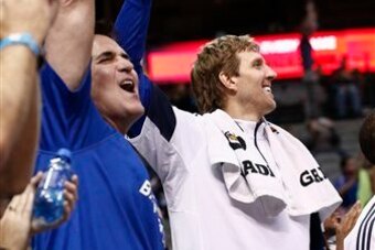 Mavericks owner Mark Cuban and Dirk Nowitzki in happy times .