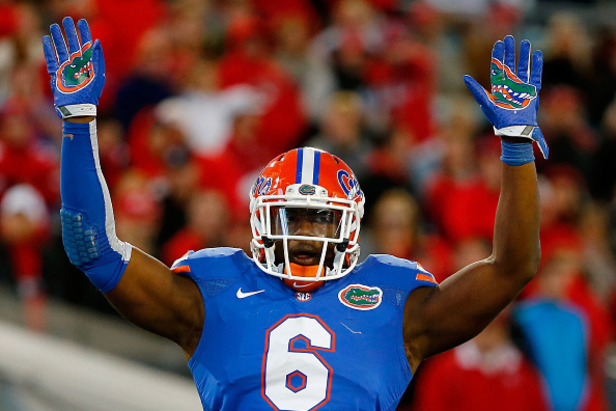JACKSONVILLE, FL - NOVEMBER 01:  Dante Fowler #6 of the Florida Gators asks the crowd for noise during the game against the Georgia Bulldogs at EverBank Field on November 1, 2014 in Jacksonville, Florida.  (Photo by Sam Greenwood/Getty Images)