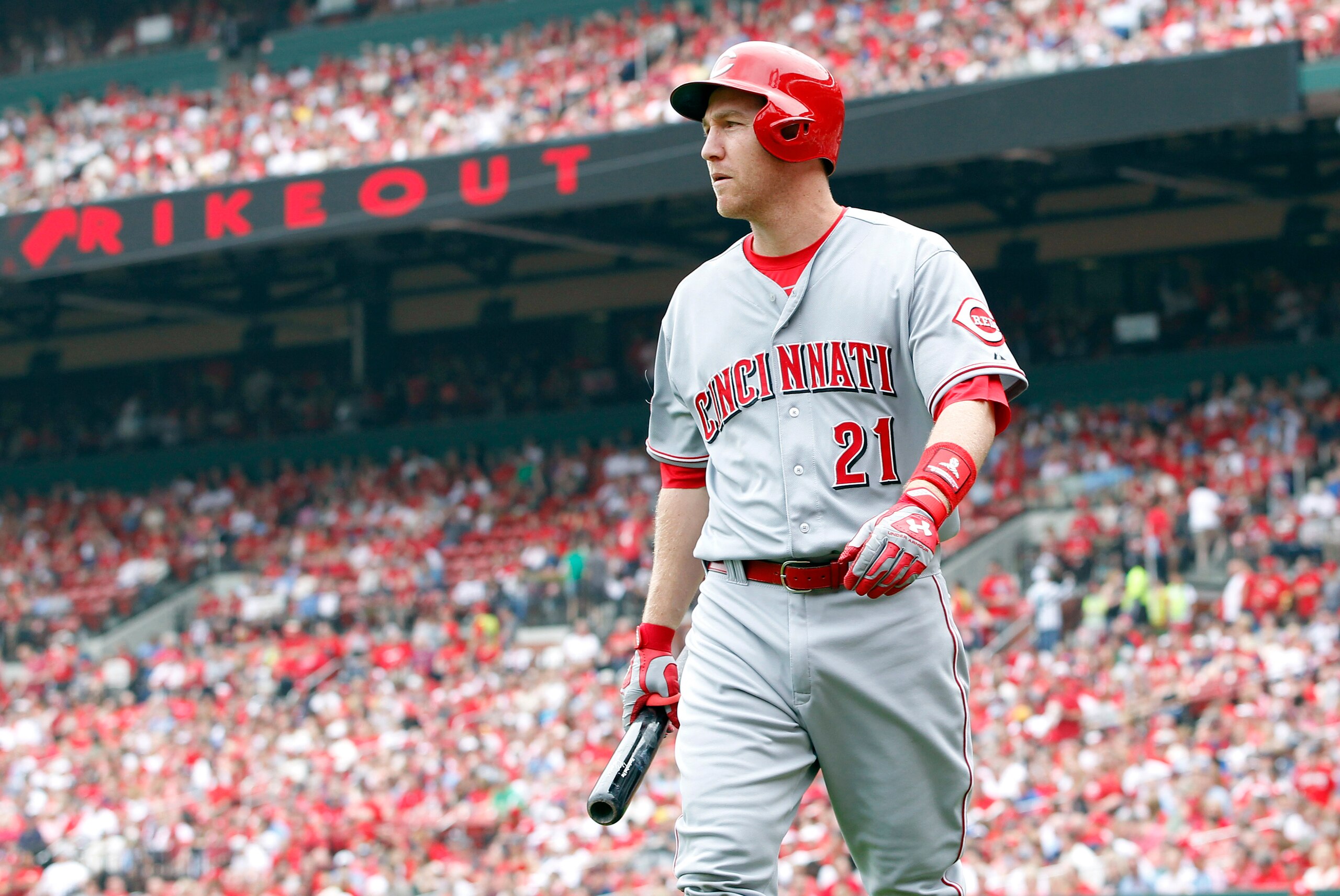 Apr 18, 2015; St. Louis, MO, USA; Cincinnati Reds third baseman Todd Frazier (21) heads back to the dugout after striking out during the first inning against the St. Louis Cardinals at Busch Stadium. Mandatory Credit: Billy Hurst-USA TODAY Sports