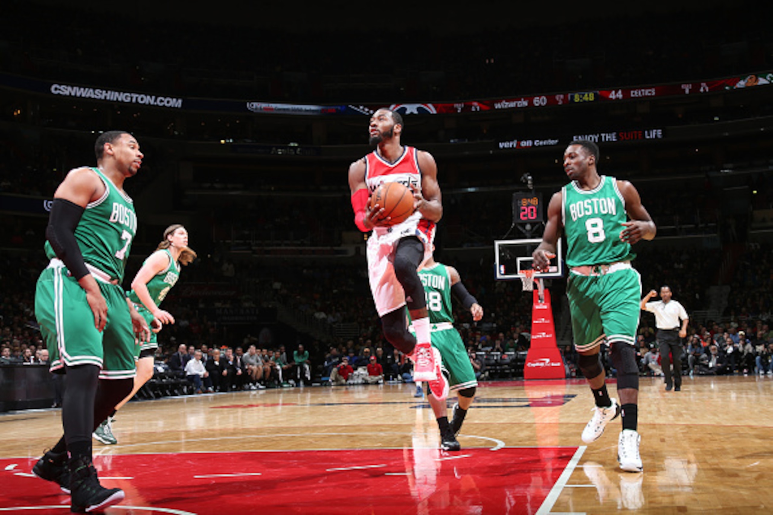 WASHINGTON, DC - DECEMBER 27: John Wall #2 of the Washington Wizards goes for the layup against the Boston Celtics during the game on December 27, 2014 at Verizon Center in Washington, District of Columbia. NOTE TO USER: User expressly acknowledges and ag