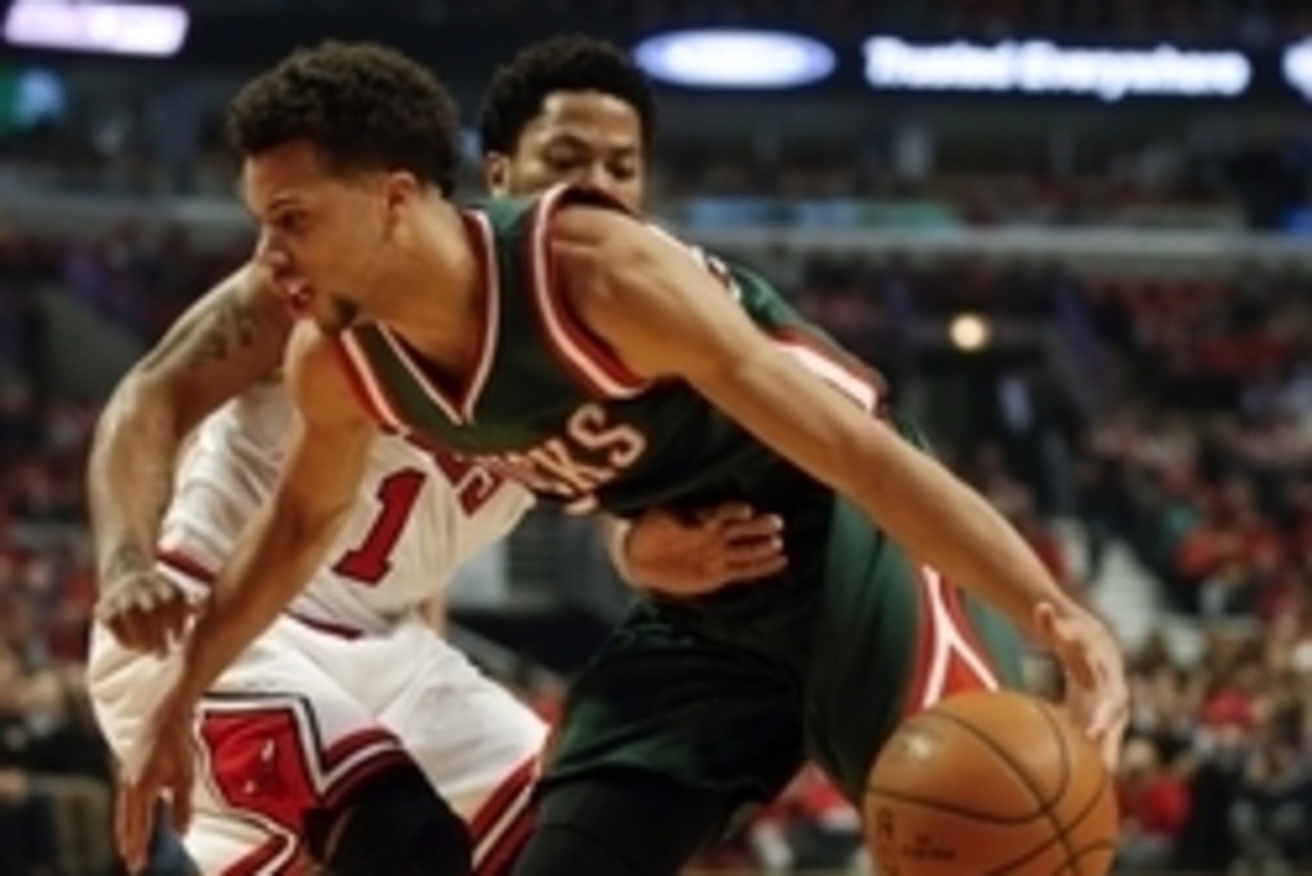 Apr 27, 2015; Chicago, IL, USA; Milwaukee Bucks guard Michael Carter-Williams (5) drives to the basket against Chicago Bulls guard Derrick Rose (1) in game five of the first round of the 2015 NBA Playoffs at United Center. Mandatory Credit: Kamil Krzaczyn Apr 27, 2015; Chicago, IL, USA; Milwaukee Bucks guard Michael Carter-Williams (5) drives to the basket against Chicago Bulls guard Derrick Rose (1) in game five of the first round of the 2015 NBA Playoffs at United Center. Mandatory Credit: Kamil Krzaczyn