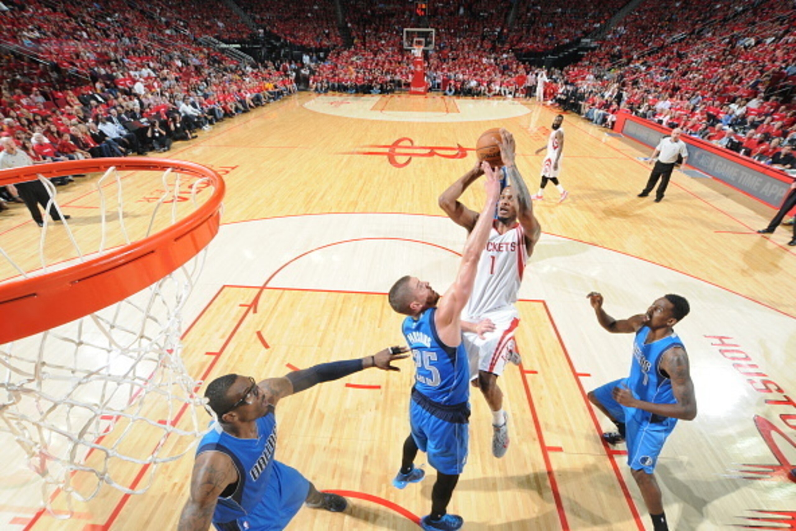 HOUSTON, TX - APRIL 18:  Trevor Ariza #1 of the Houston Rockets shoots the ball against the Dallas Mavericks in Game One of the Western Conference Quarterfinals during the NBA Playoffs on April 18, 2015 at the Toyota Center in Houston, Texas. NOTE TO USER