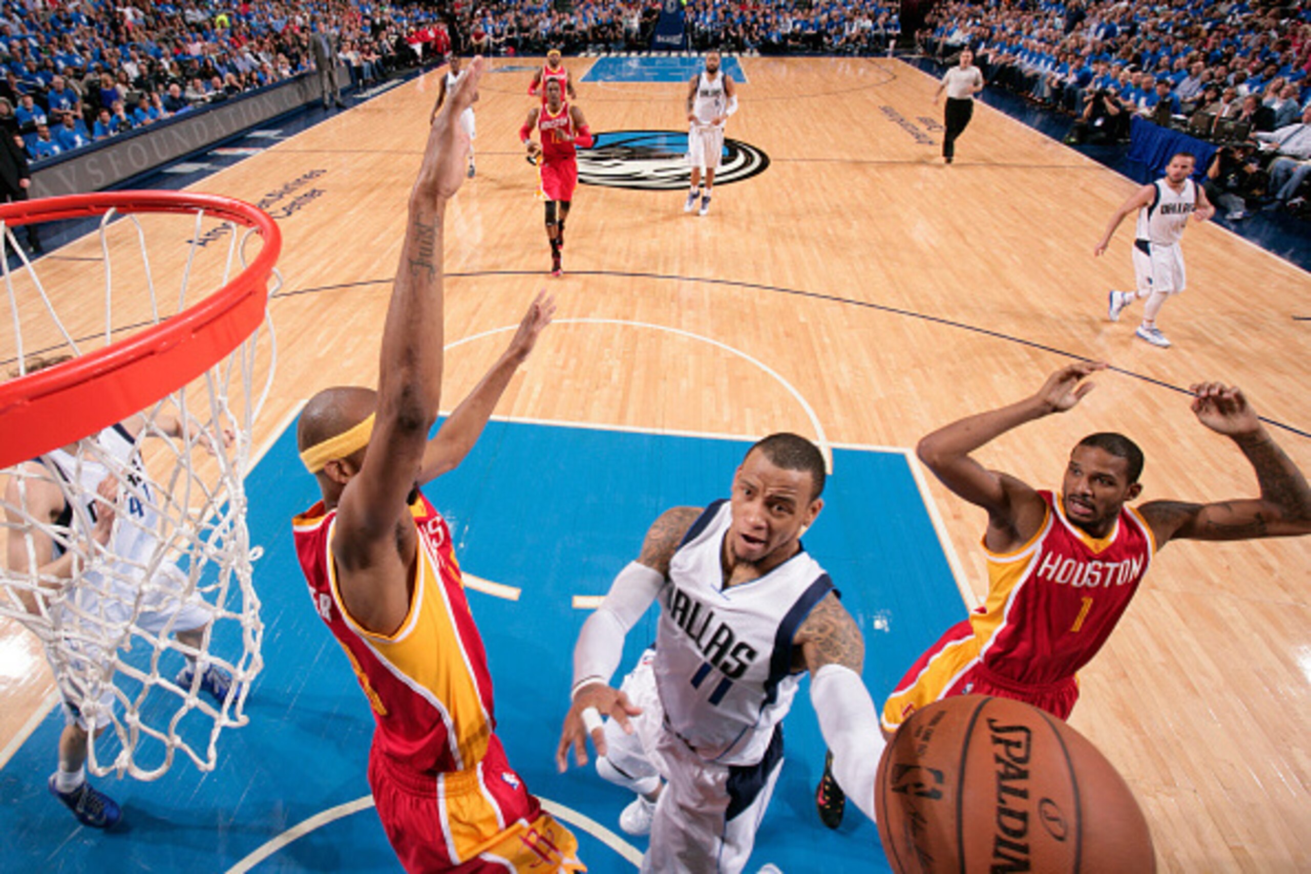 DALLAS, TX - APRIL 26: Monta Ellis #11 of the Dallas Mavericks goes in for the layup against the Houston Rockets during Game Four of the Western Conference Quarterfinals of the 2015 NBA Playoffs on April 26, 2015 at the American Airlines Center in Dallas,