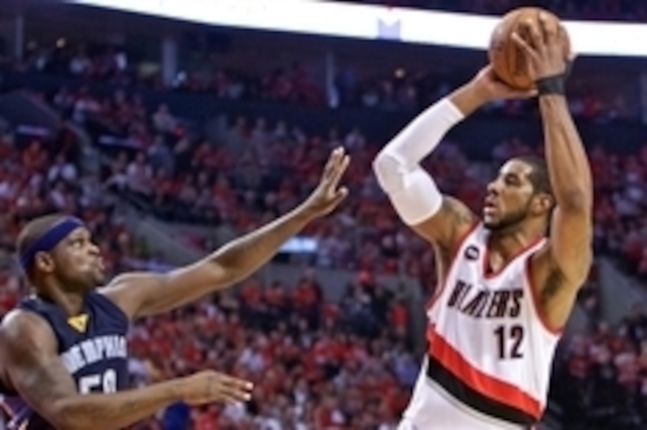 Apr 27, 2015; Portland, OR, USA; Portland Trail Blazers forward LaMarcus Aldridge (12) shoots over Memphis Grizzlies forward Zach Randolph (50) during the second quarter in game four of the first round of the NBA Playoffs at the Moda Center. Mandatory Cre Apr 27, 2015; Portland, OR, USA; Portland Trail Blazers forward LaMarcus Aldridge (12) shoots over Memphis Grizzlies forward Zach Randolph (50) during the second quarter in game four of the first round of the NBA Playoffs at the Moda Center. Mandatory Cre