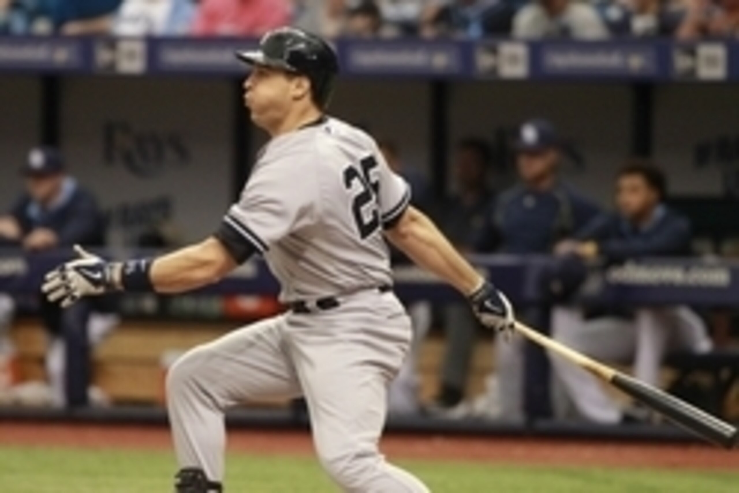 Apr 19, 2015; St. Petersburg, FL, USA; New York Yankees first baseman Mark Teixeira (25) hits a ground out RBI during the third inning against the Tampa Bay Rays at Tropicana Field. Mandatory Credit: Kim Klement-USA TODAY Sports