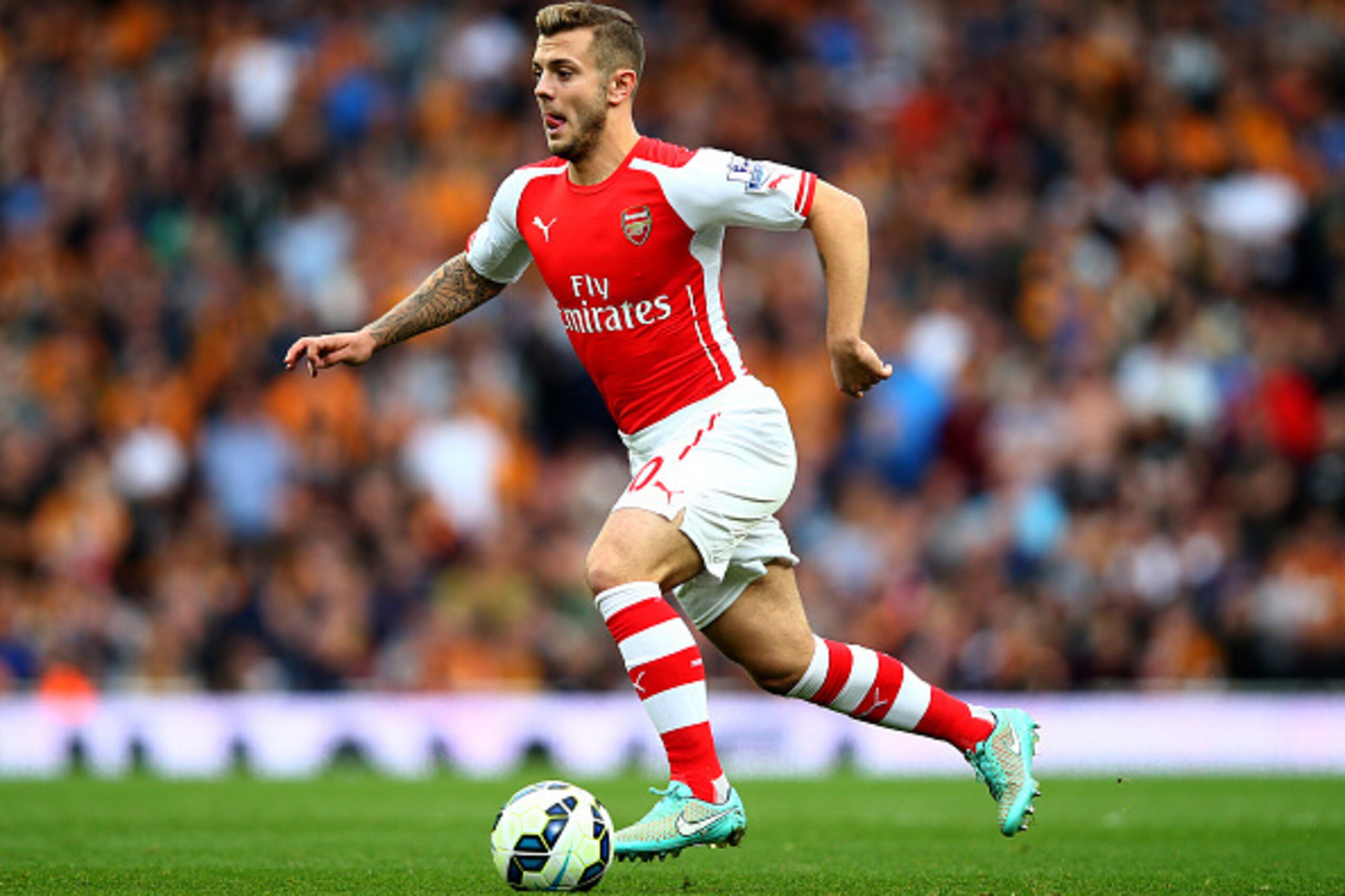 LONDON, ENGLAND - OCTOBER 18:  Jack Wilshere of Arsenal in action during the Barclays Premier League match between Arsenal and Hull City at Emirates Stadium on October 18, 2014 in London, England.  (Photo by Clive Rose/Getty Images)