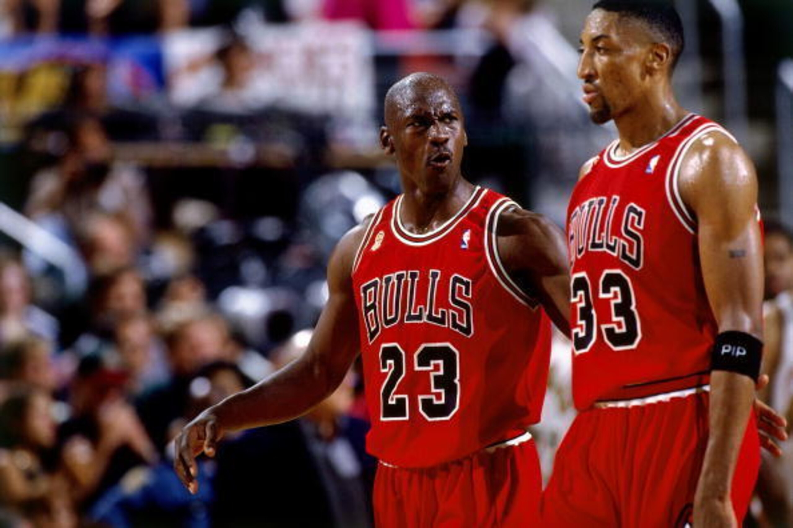 SEATTLE - JUNE 14:  Michael Jordan #23 and Scottie Pippen #33 of the Chicago Bulls discuss strategy in Game Five of the 1996 NBA Finals against the Seattle SuperSonics at Key Arena on June 14, 1996 in Seattle, Washington. The Sonics won 89-78.  NOTE TO US
