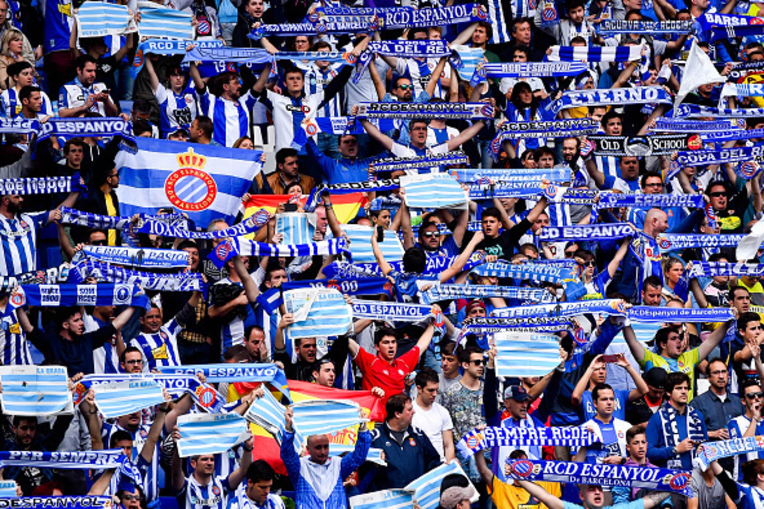 BARCELONA, SPAIN - APRIL 25:  RCD Espanyol supporters cheer on their team during the La Liga match between RCD Espanyol and FC Barcelona at Cornella-El Prat Stadium on April 25, 2015 in Barcelona, Spain.  (Photo by David Ramos/Getty Images)
