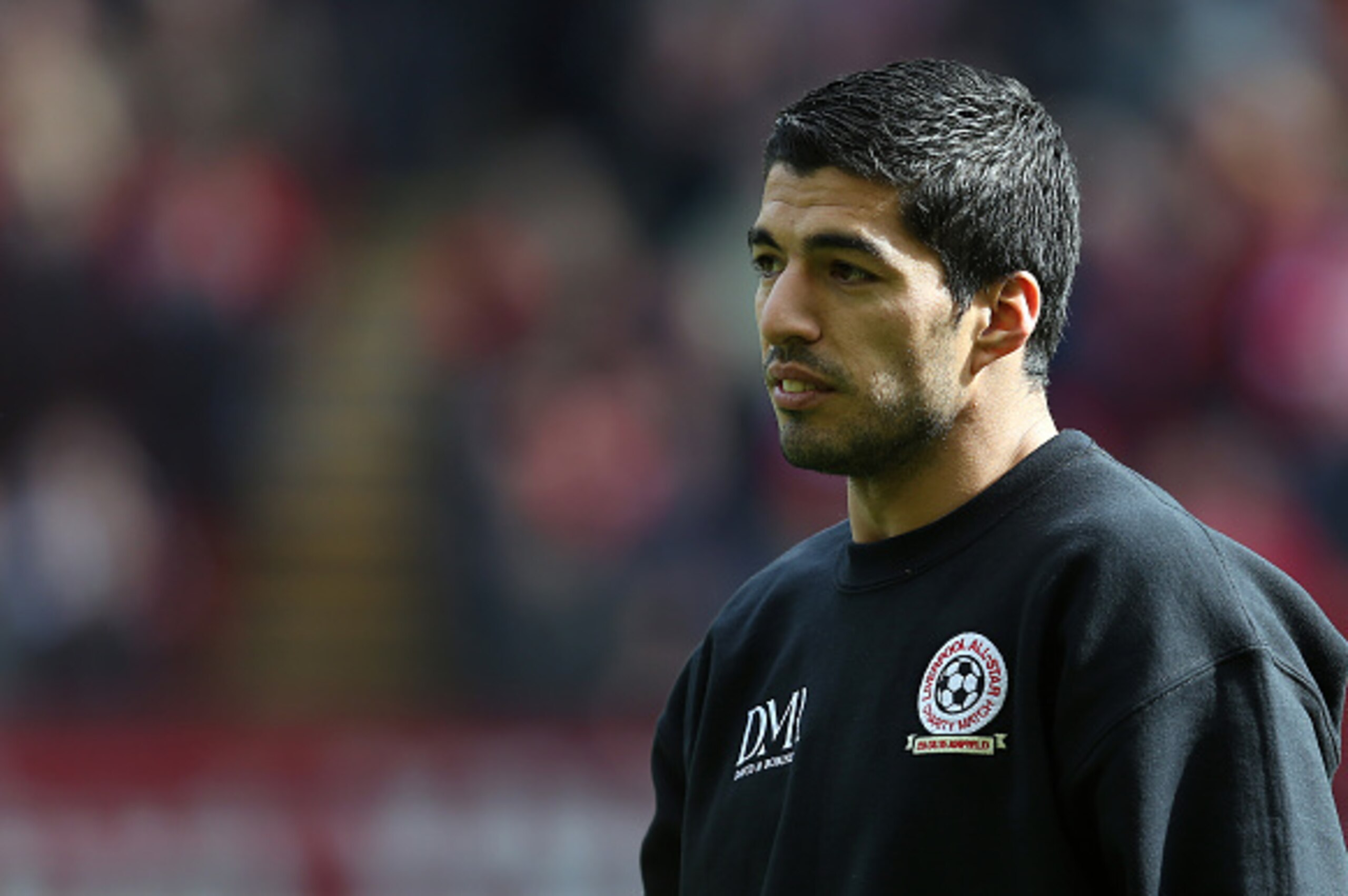 LIVERPOOL, ENGLAND - MARCH 29: Luis Suarez of the Gerrard XI looks on ahead of the Liverpool All-Star Charity match at Anfield on March 29, 2015 in Liverpool, England. (Photo by Chris Brunskill/Getty Images) LIVERPOOL, ENGLAND - MARCH 29: Luis Suarez of the Gerrard XI looks on ahead of the Liverpool All-Star Charity match at Anfield on March 29, 2015 in Liverpool, England. (Photo by Chris Brunskill/Getty Images)