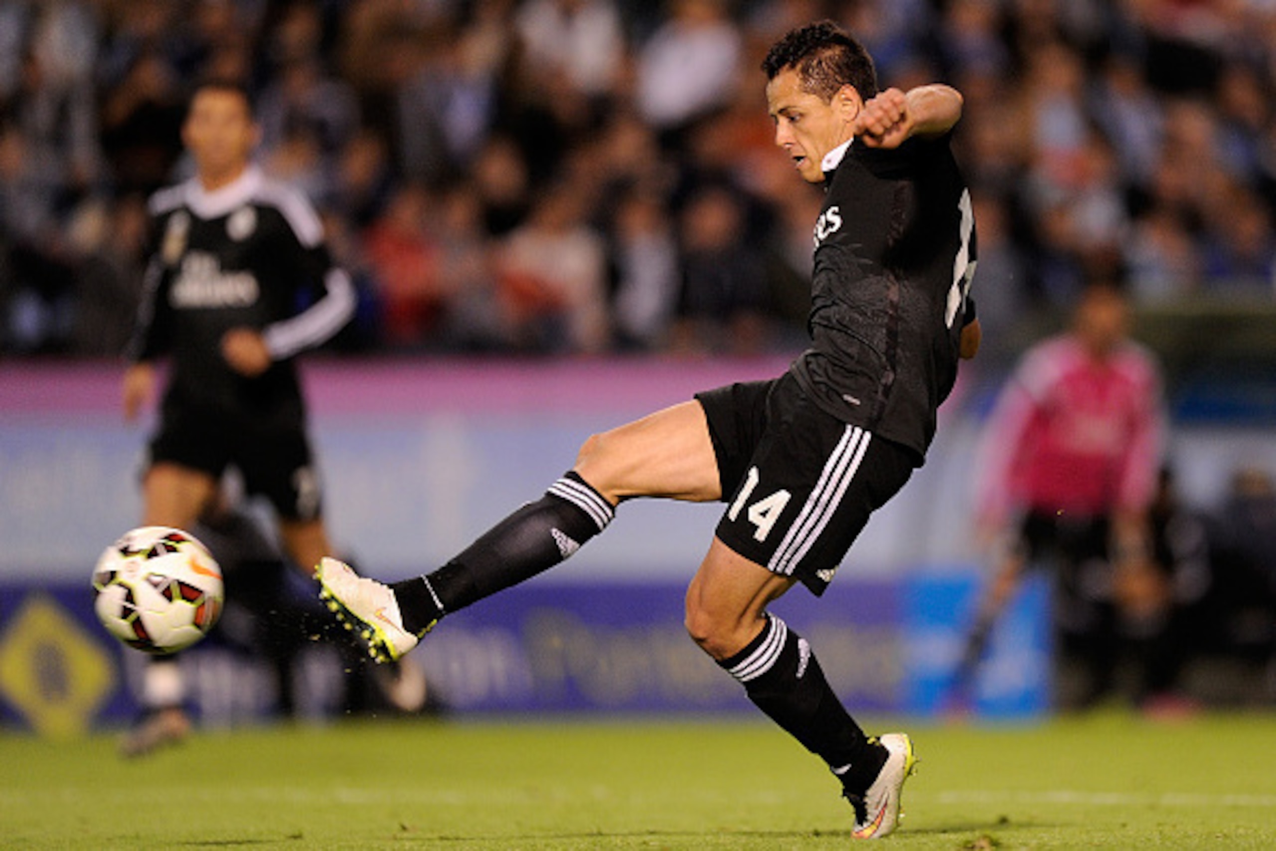 VIGO, SPAIN - APRIL 26:  Javier 'Chicharito' Hernandez of Real Madrid scores Real's 4th goal during the La Liga match between Celta Vigo and Real Madrid CF at Estadio Balaidos on April 26, 2015 in Vigo, Spain.  (Photo by Denis Doyle/Getty Images)