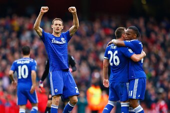 LONDON, ENGLAND - APRIL 26:  Nemanja Matic of Chelsea (21) celebrates with team mates after the Barclays Premier League match between Arsenal and Chelsea at Emirates Stadium on April 26, 2015 in London, England.  (Photo by Julian Finney/Getty Images)