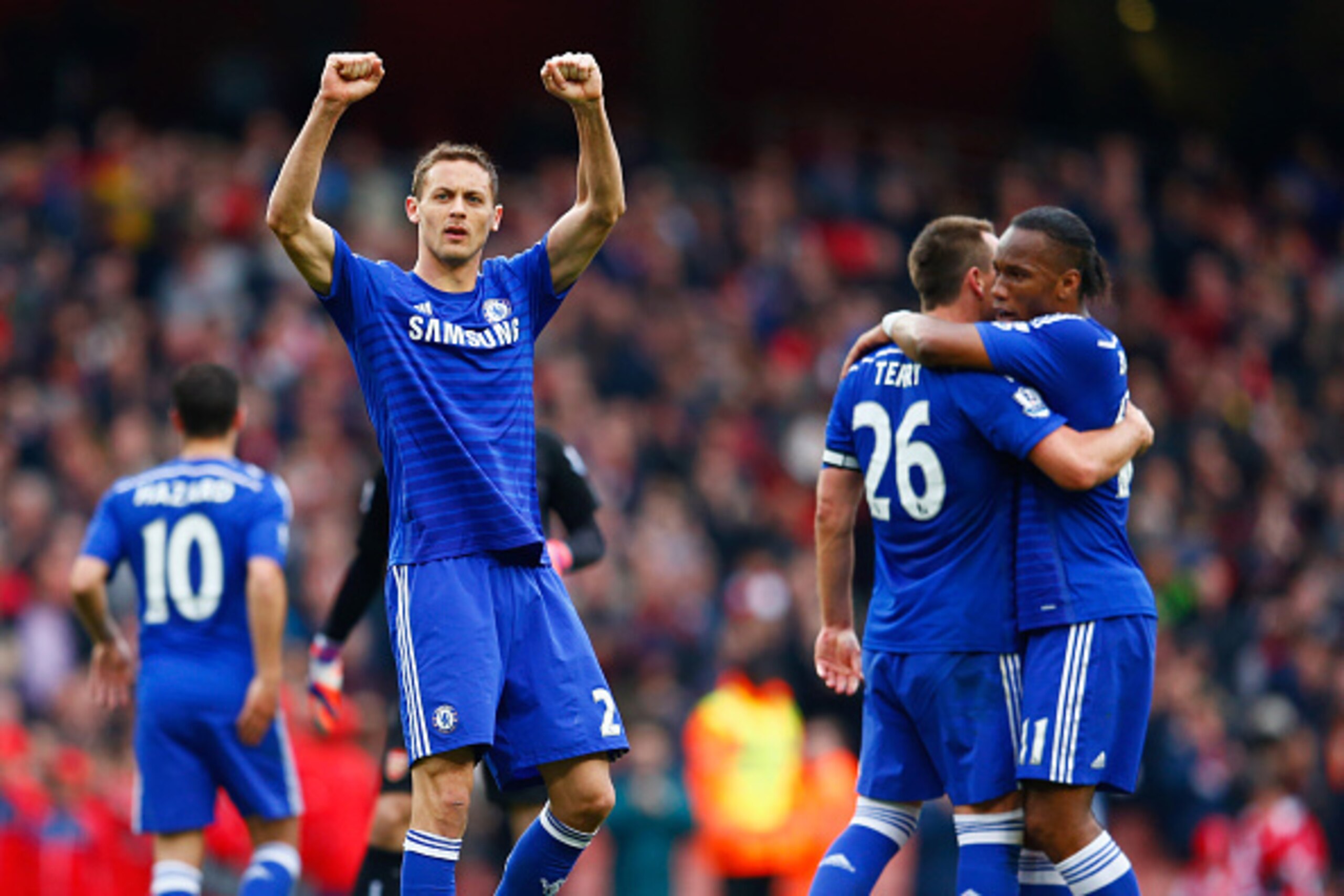 LONDON, ENGLAND - APRIL 26:  Nemanja Matic of Chelsea (21) celebrates with team mates after the Barclays Premier League match between Arsenal and Chelsea at Emirates Stadium on April 26, 2015 in London, England.  (Photo by Julian Finney/Getty Images)