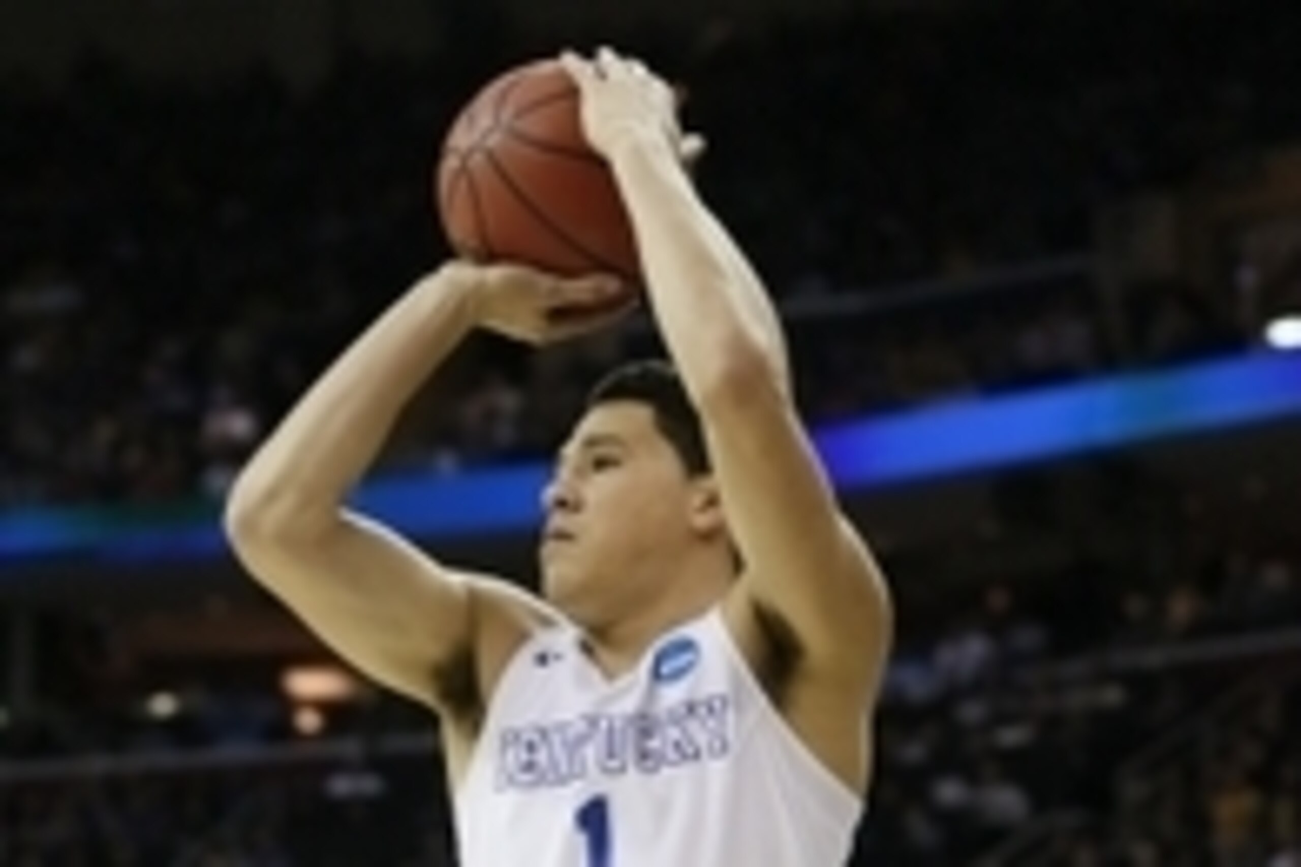 Mar 26, 2015; Cleveland, OH, USA; Kentucky Wildcats guard Devin Booker (1) shoots during the first half against the West Virginia Mountaineers in the semifinals of the midwest regional of the 2015 NCAA Tournament at Quicken Loans Arena. Mandatory Credit: 