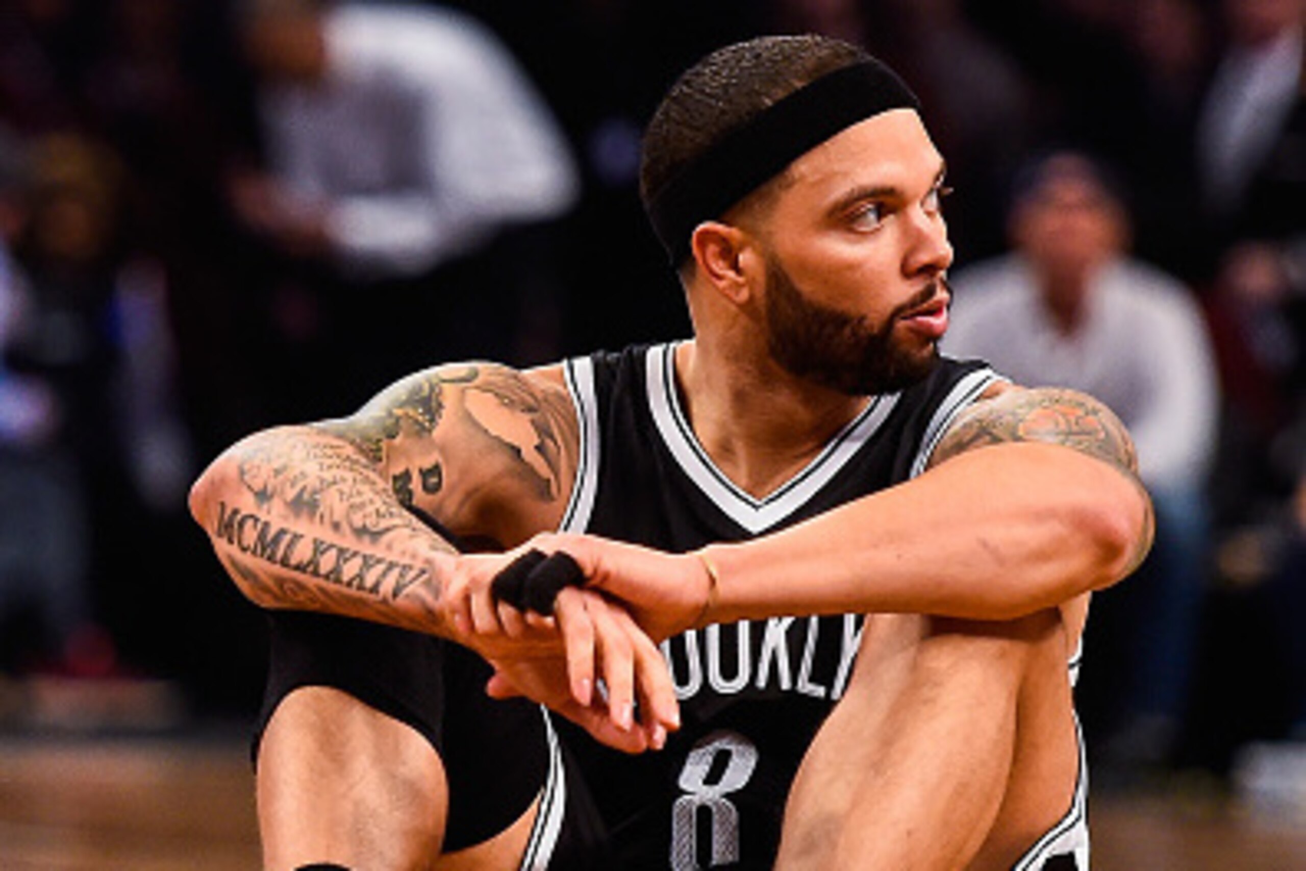 NEW YORK, NY - APRIL 25: Deron Williams #8 of the Brooklyn Nets looks on during the first round of the 2015 NBA Playoffs against the Atlanta Hawks at Barclays Center on April 25, 2015 in the Brooklyn borough of New York City. NOTE TO USER: User expressly 