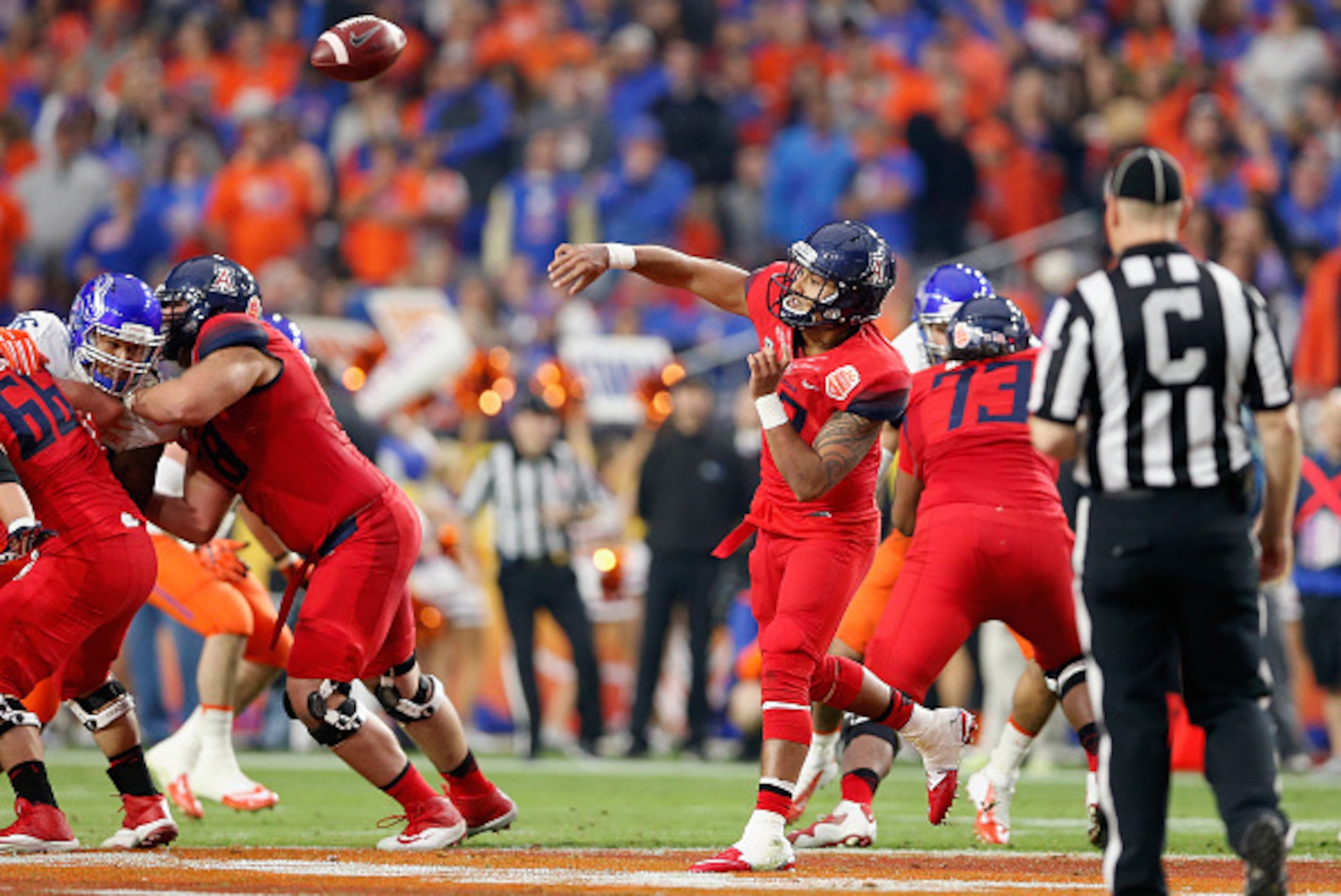 GLENDALE, AZ - DECEMBER 31: Quarterback Anu Solomon #12 of the Arizona Wildcats throws the football during the first quarter of the Vizio Fiesta Bowl against the Boise State Broncos at University of Phoenix Stadium on December 31, 2014 in Glendale, Arizo GLENDALE, AZ - DECEMBER 31: Quarterback Anu Solomon #12 of the Arizona Wildcats throws the football during the first quarter of the Vizio Fiesta Bowl against the Boise State Broncos at University of Phoenix Stadium on December 31, 2014 in Glendale, Arizo