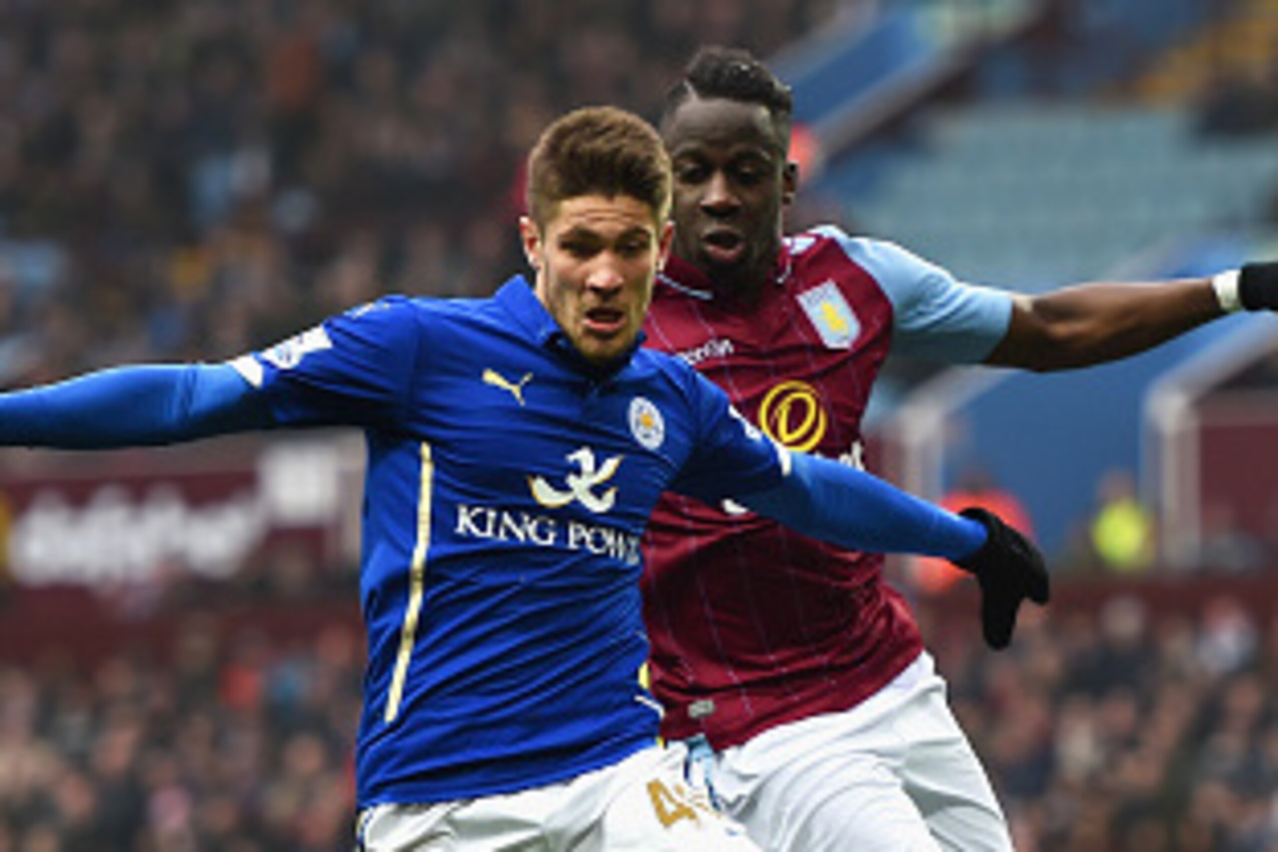 BIRMINGHAM, ENGLAND - FEBRUARY 15:  Andrej Kramaric of Leicester City and Aly Cissokho of Aston Villa compete for the ball during the FA Cup fifth round match between Aston Villa and Leicester City at Villa Park on February 15, 2015 in Birmingham, England