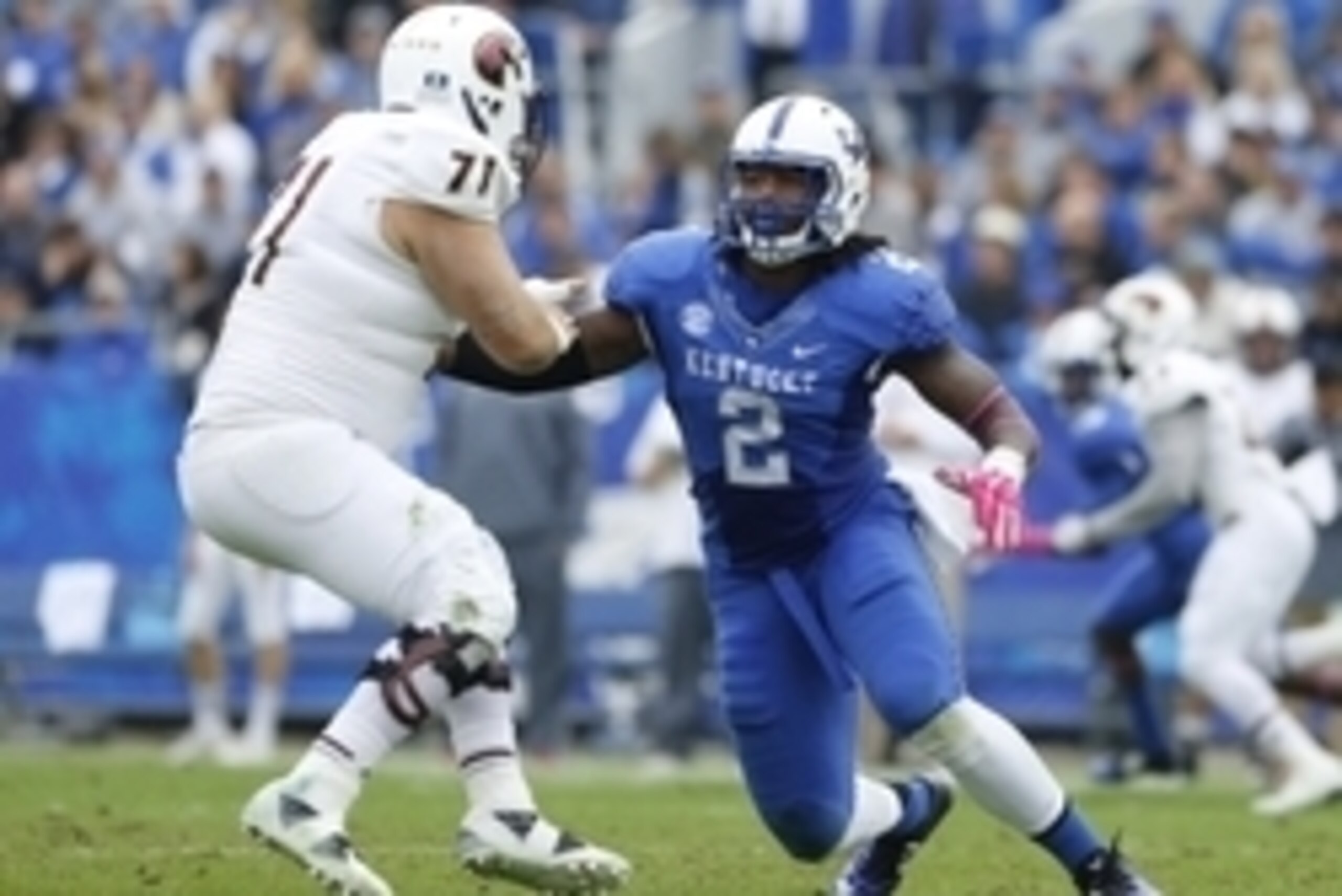 Oct 11, 2014; Lexington, KY, USA; Louisiana-Monroe Warhawks offensive lineman Chase Regian (71) and Kentucky Wildcats defensive end Alvin Dupree (2) during the game at Commonwealth Stadium. Kentucky defeated Louisiana-Monroe 48-14. Mandatory Credit: Mark 