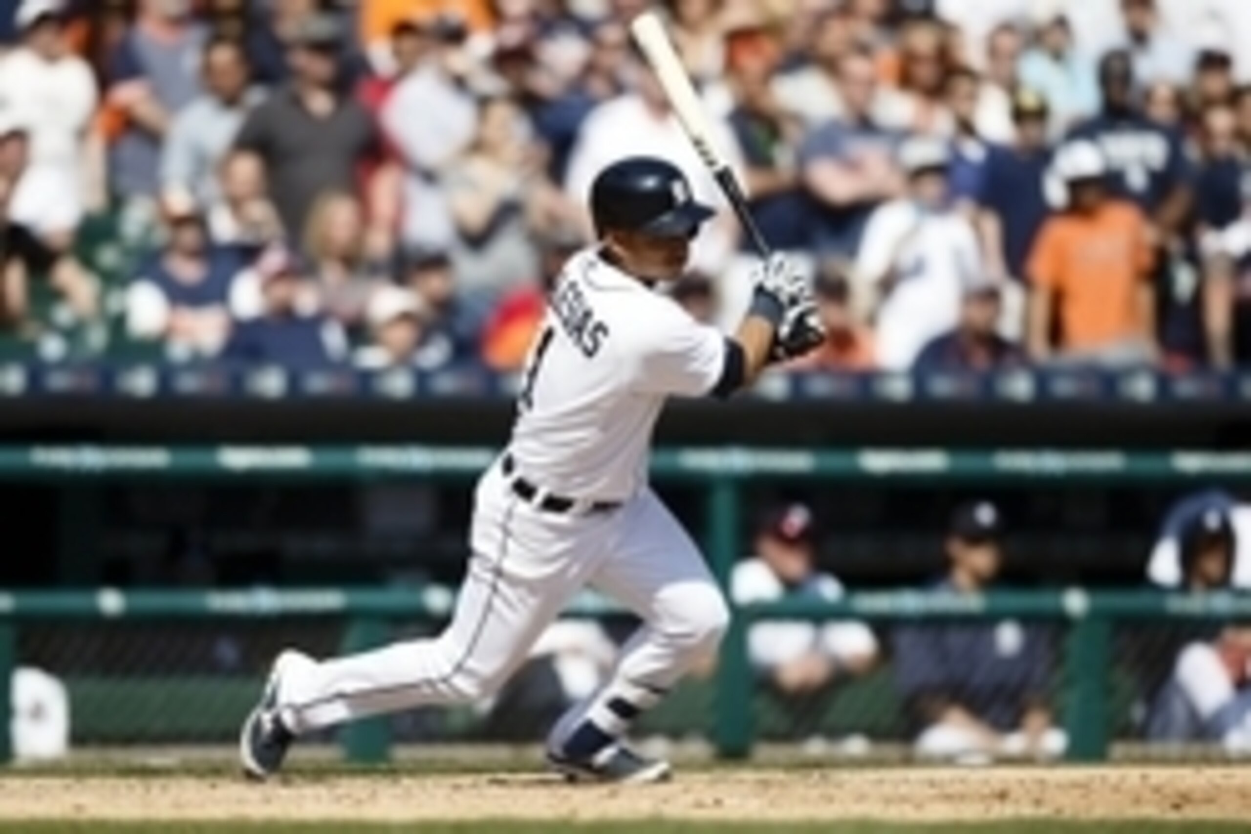 Apr 17, 2015; Detroit, MI, USA; Detroit Tigers shortstop Jose Iglesias (1) hits a game wining RBI single in the ninth inning against the Chicago White Sox at Comerica Park. Detroit won 2-1. Mandatory Credit: Rick Osentoski-USA TODAY Sports