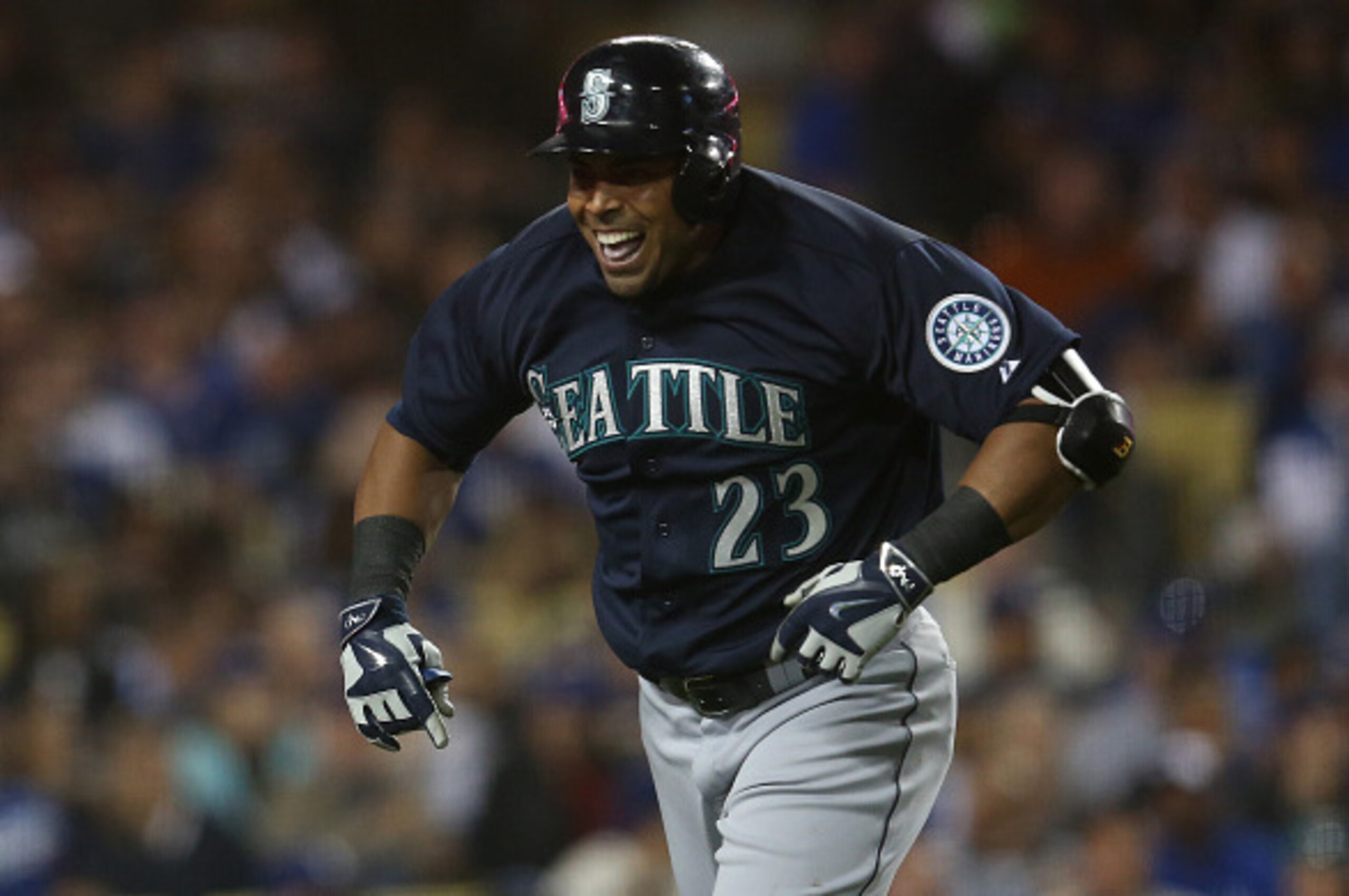 LOS ANGELES, CA - APRIL 13:  Nelson Cruz #23 of the Seattle Mariners celebrates as he returns to the dugout after hitting his second home run of the game,  in the fourth inning against the Los Angeles Dodgers at Dodger Stadium on April 13, 2015 in Los Ang