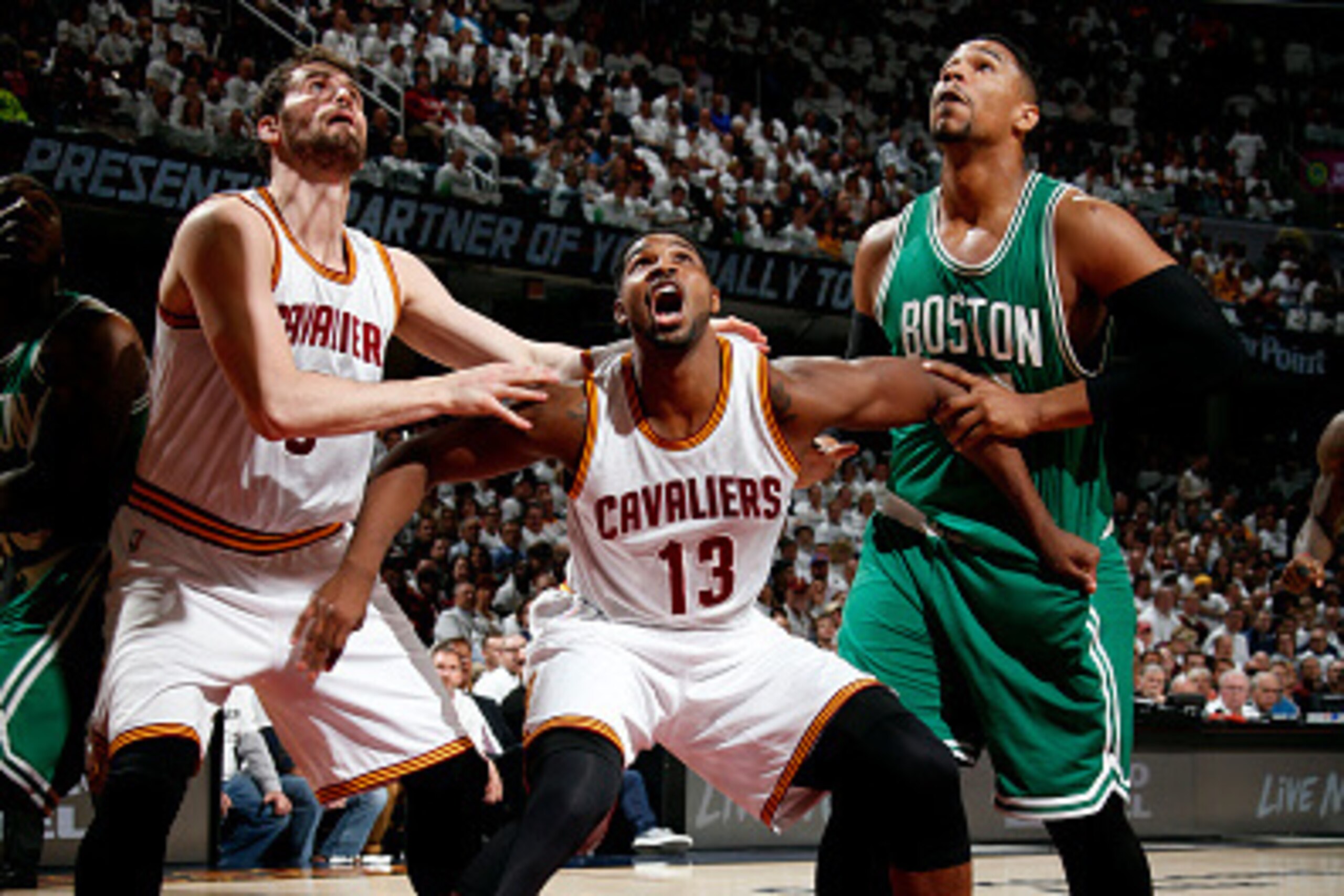 CLEVELAND, OH - APRIL 21: Kevin Love #0 and Tristan Thompson #13 of the Cleveland Cavaliers battles for position against Jared Sullinger #7 of the Boston Celtics during Game Two of the Eastern Conference Quarterfinals of the NBA Playoffs at The Quicken Lo