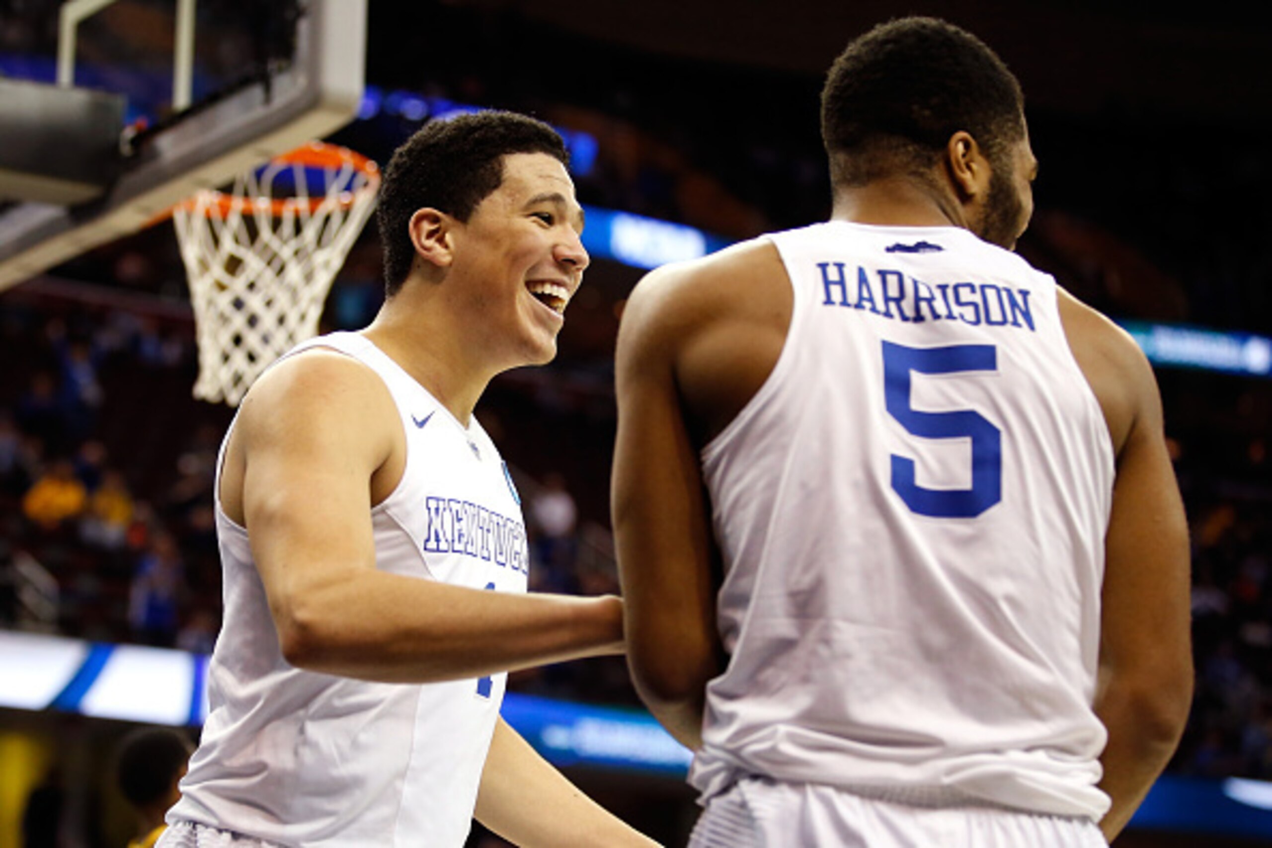 CLEVELAND, OH - MARCH 26: Devin Booker #1 of the Kentucky Wildcats reacts with Andrew Harrison #5 after a basket in the second half against the West Virginia Mountaineers during the Midwest Regional semifinal of the 2015 NCAA Men's Basketball Tournament a