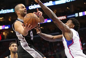 LOS ANGELES, CA - APRIL 28:  Tony Parker #9 of the San Antonio Spurs shoots over DeAndre Jordan #6 of the Los Angeles Clippers during Game Five of the Western Conference quarterfinals of the 2015 NBA Playoffs at Staples Center on April 28, 2015 in Los Ang