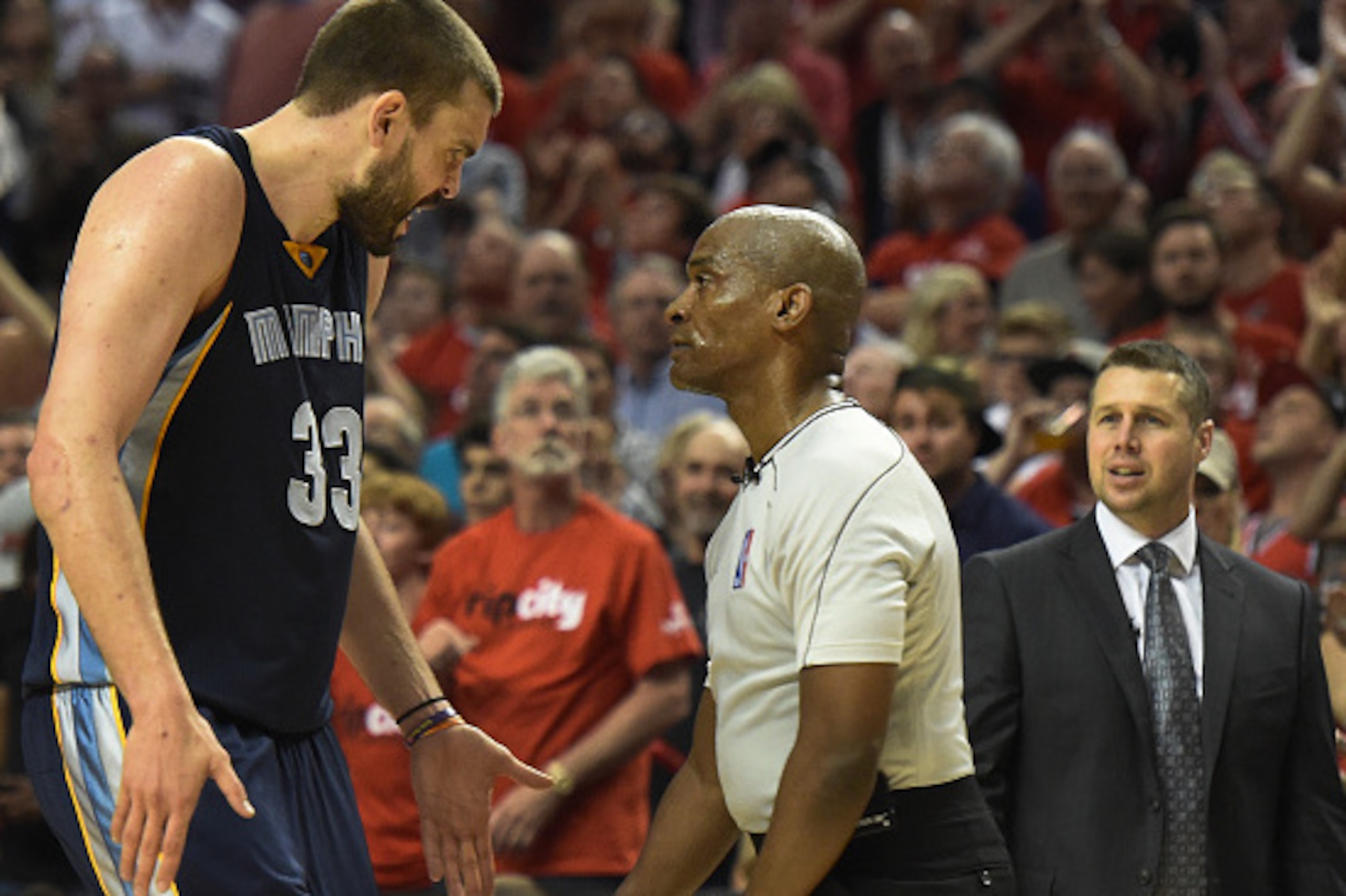 PORTLAND, OR - APRIL 27: Marc Gasol #33 of the Memphis Grizzlies has some words with referee Derrick Collins #11 in the fourth quarter of Game Four of the Western Conference quarterfinals during the 2015 NBA Playoffs at Moda Center on April 27, 2015 in Po