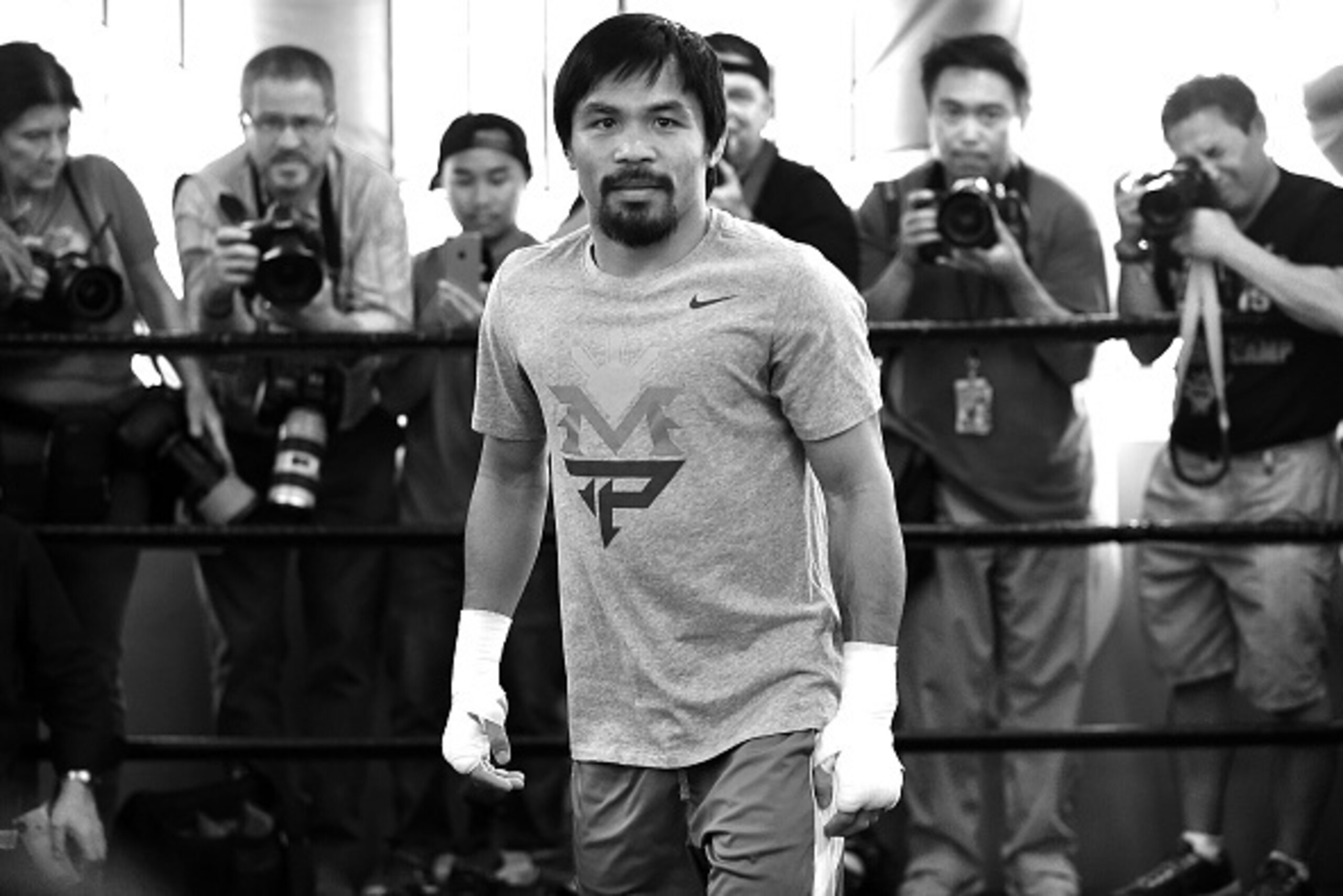 LOS ANGELES, CA - APRIL 15: (EDITOR'S NOTE: Image has been converted to black and white.) Portrait of Manny Pacquiao before a workout in preparation for his fight against Floyd Mayweather Jr. at Wild Card Boxing Club on April 15, 2015 in Los Angeles, Cal LOS ANGELES, CA - APRIL 15: (EDITOR'S NOTE: Image has been converted to black and white.) Portrait of Manny Pacquiao before a workout in preparation for his fight against Floyd Mayweather Jr. at Wild Card Boxing Club on April 15, 2015 in Los Angeles, Cal