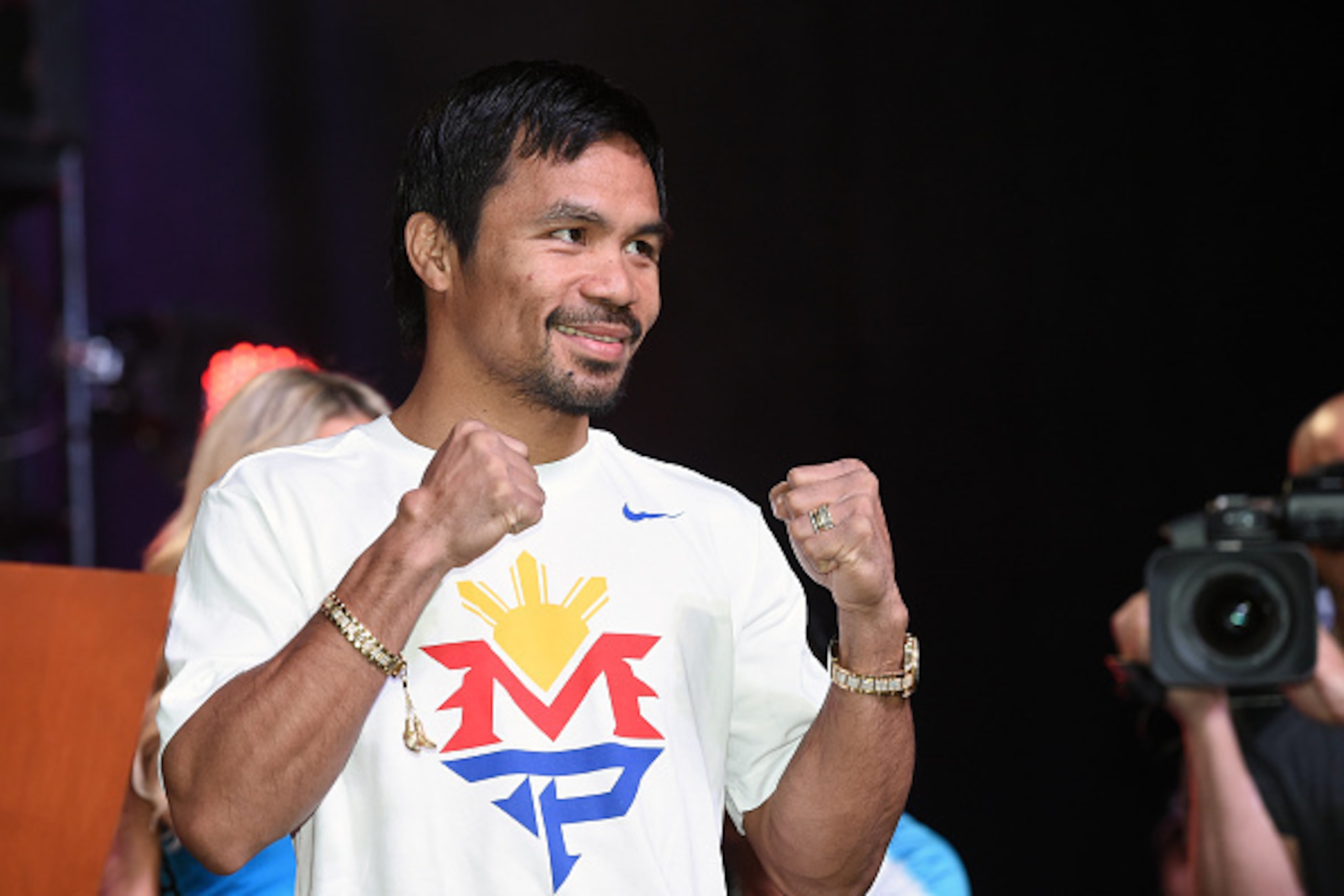 LAS VEGAS, NV - APRIL 28:  WBO welterweight champion Manny Pacquiao poses during a fan rally at the Mandalay Bay Convention Center on April 28, 2015 in Las Vegas, Nevada. Pacquiao will face WBC/WBA welterweight champion Floyd Mayweather Jr. in a unificati
