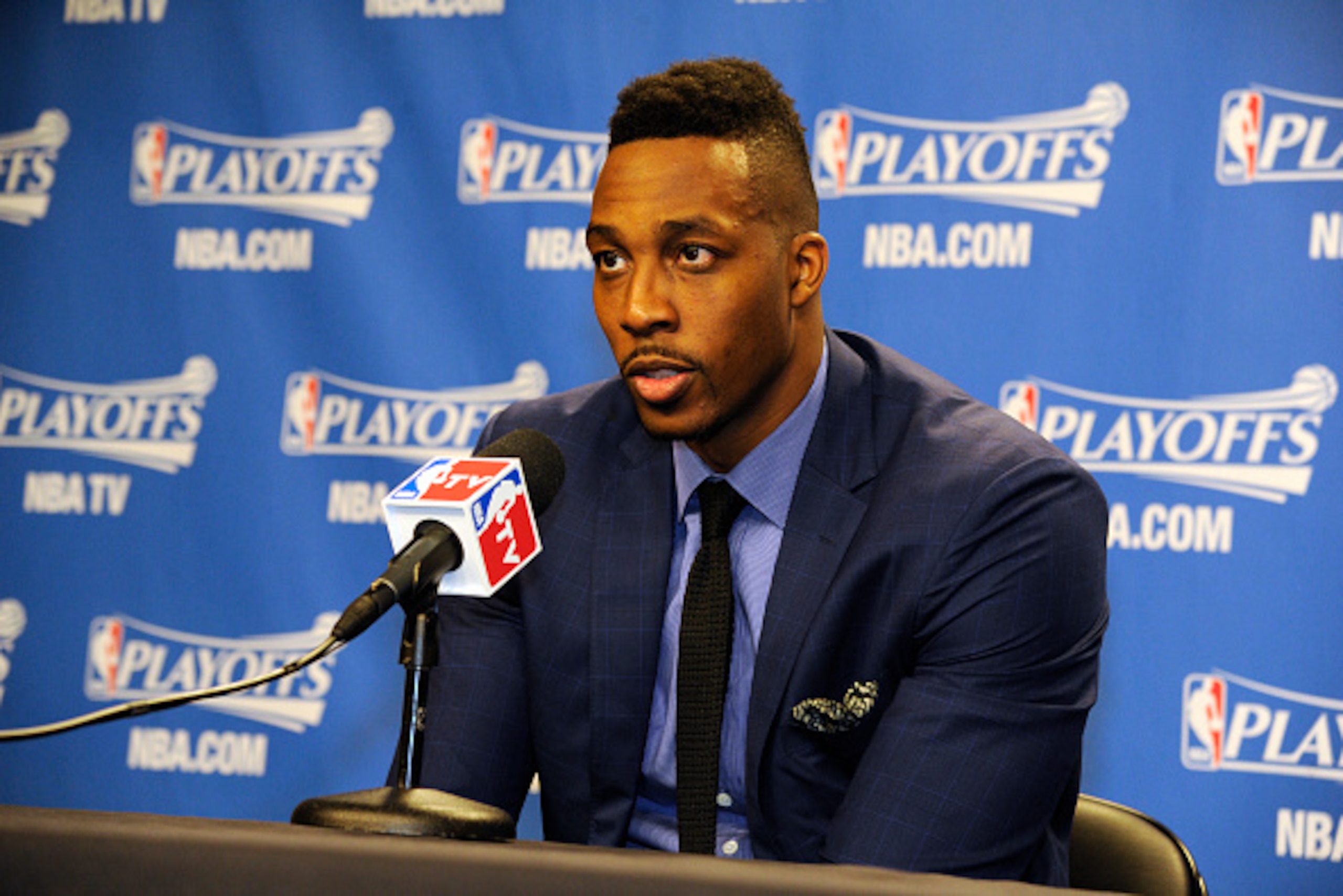 DALLAS, TX - APRIL 26: Dwight Howard #12 of the Houston Rockets talks to the media after Game Four of the Western Conference Quarterfinals against the Dallas Mavericks during the 2015 NBA Playoffs on April 26, 2015 at the American Airlines Center in Dall DALLAS, TX - APRIL 26: Dwight Howard #12 of the Houston Rockets talks to the media after Game Four of the Western Conference Quarterfinals against the Dallas Mavericks during the 2015 NBA Playoffs on April 26, 2015 at the American Airlines Center in Dall