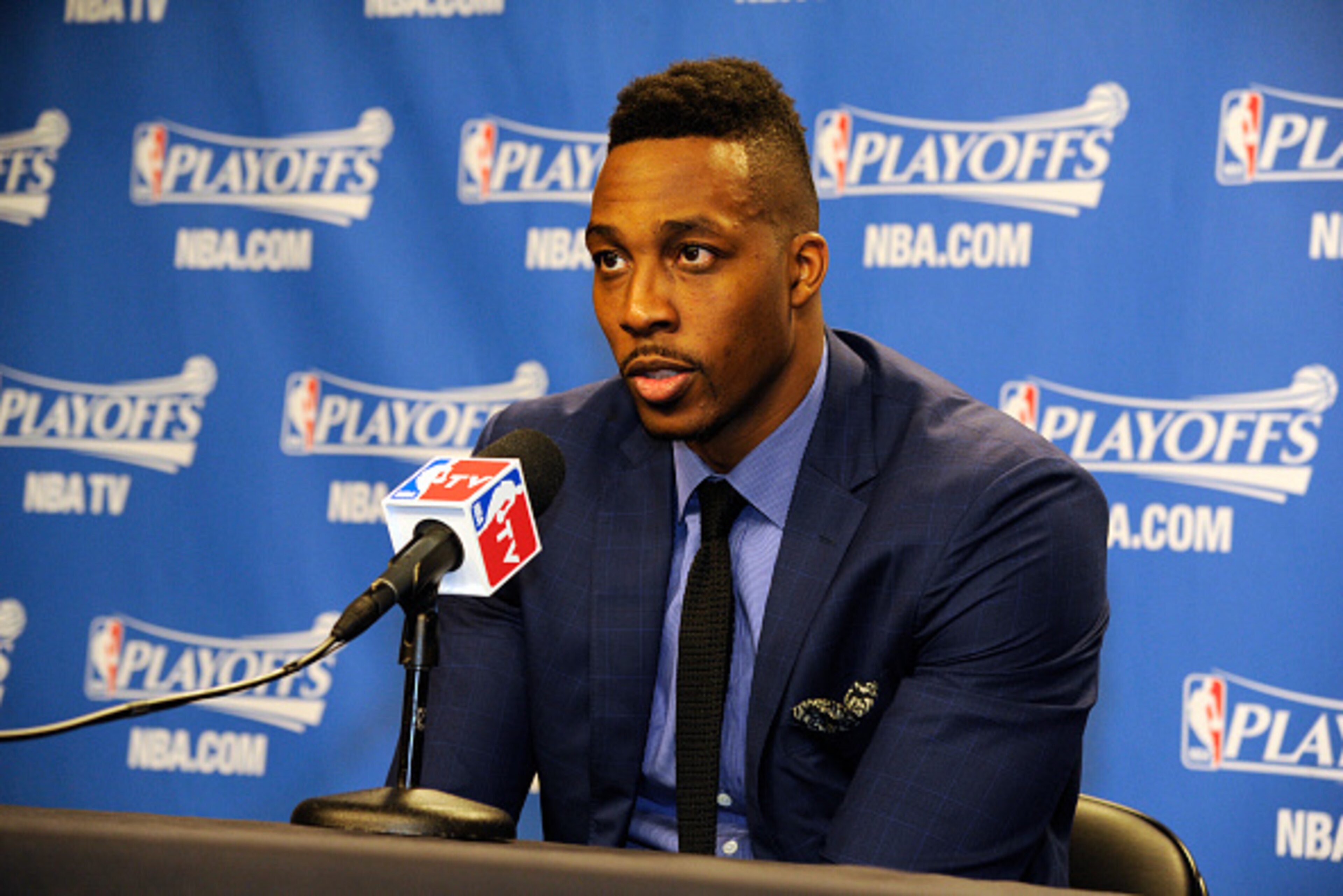 DALLAS, TX - APRIL 26:  Dwight Howard #12 of the Houston Rockets talks to the media after Game Four of the Western Conference Quarterfinals against the Dallas Mavericks during the 2015 NBA Playoffs on April 26, 2015 at the American Airlines Center in Dall
