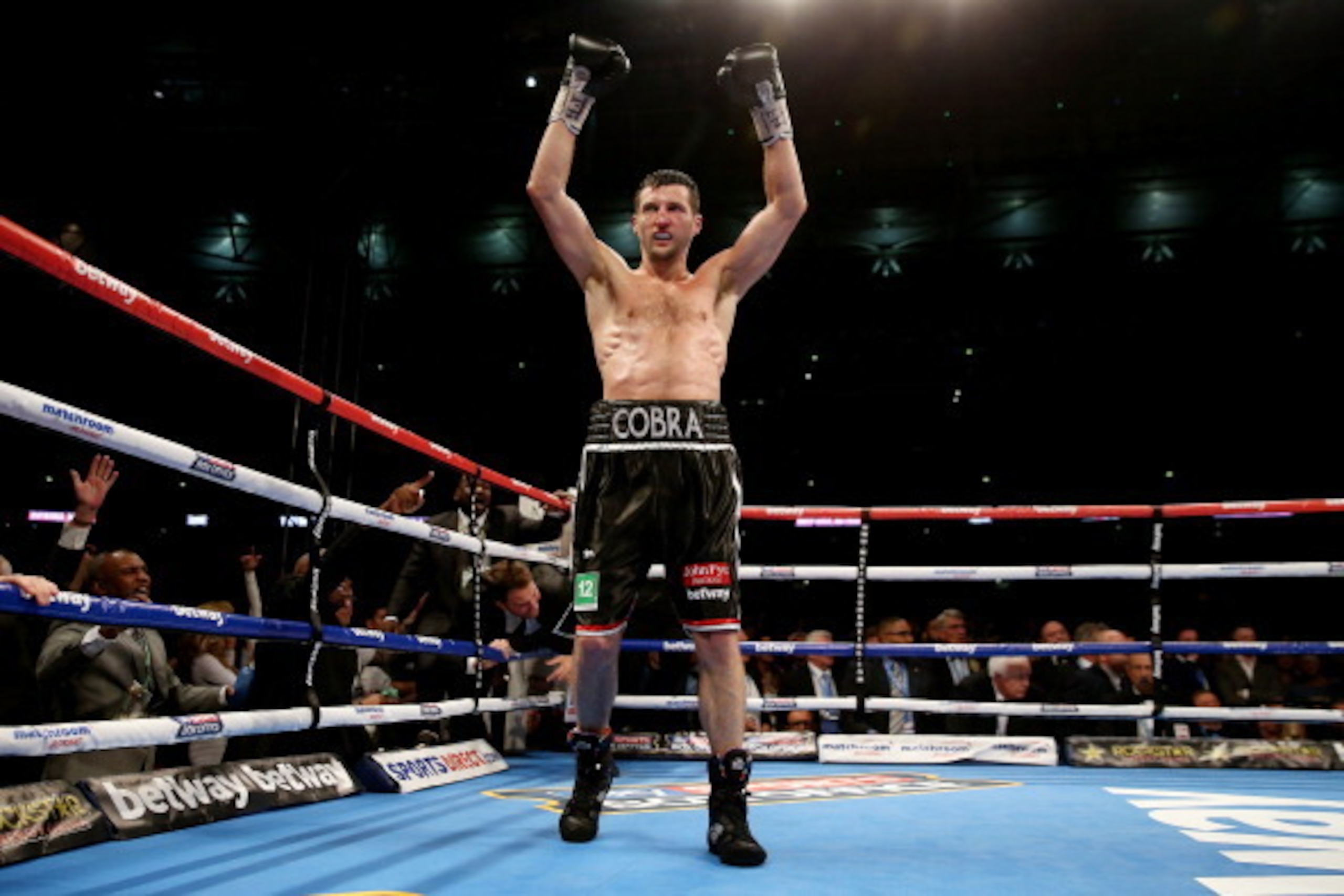LONDON, ENGLAND - MAY 31:  Carl Froch celebrates after his victory over Geroge Groves during their IBF and WBA World Super Middleweight bout at Wembley Stadium on May 31, 2014 in London, England.  (Photo by Scott Heavey/Getty Images)