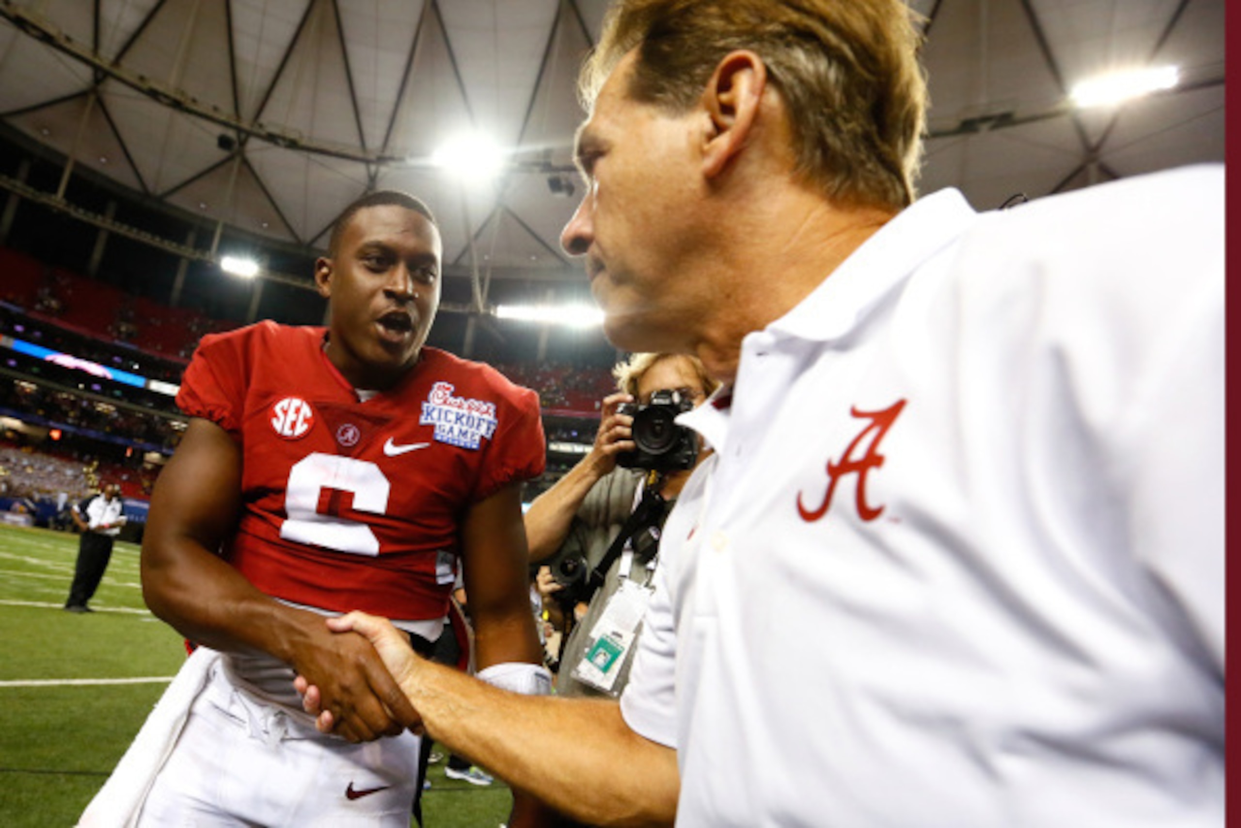 ATLANTA, GA - AUGUST 30:  Head coach Nick Saban of the Alabama Crimson Tide shakes hands with Blake Sims #6 after their 33-23 win over West Virginia Mountaineers at Georgia Dome on August 30, 2014 in Atlanta, Georgia.  (Photo by Kevin C. Cox/Getty Images)