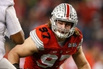 Jan 12, 2015; Arlington, TX, USA; Ohio State Buckeyes defensive lineman Joey Bosa (97) in game action against the Oregon Ducks in the 2015 CFP National Championship Game at AT&T Stadium. Ohio State won 42-20. Mandatory Credit: Tim Heitman-USA TODAY Sports