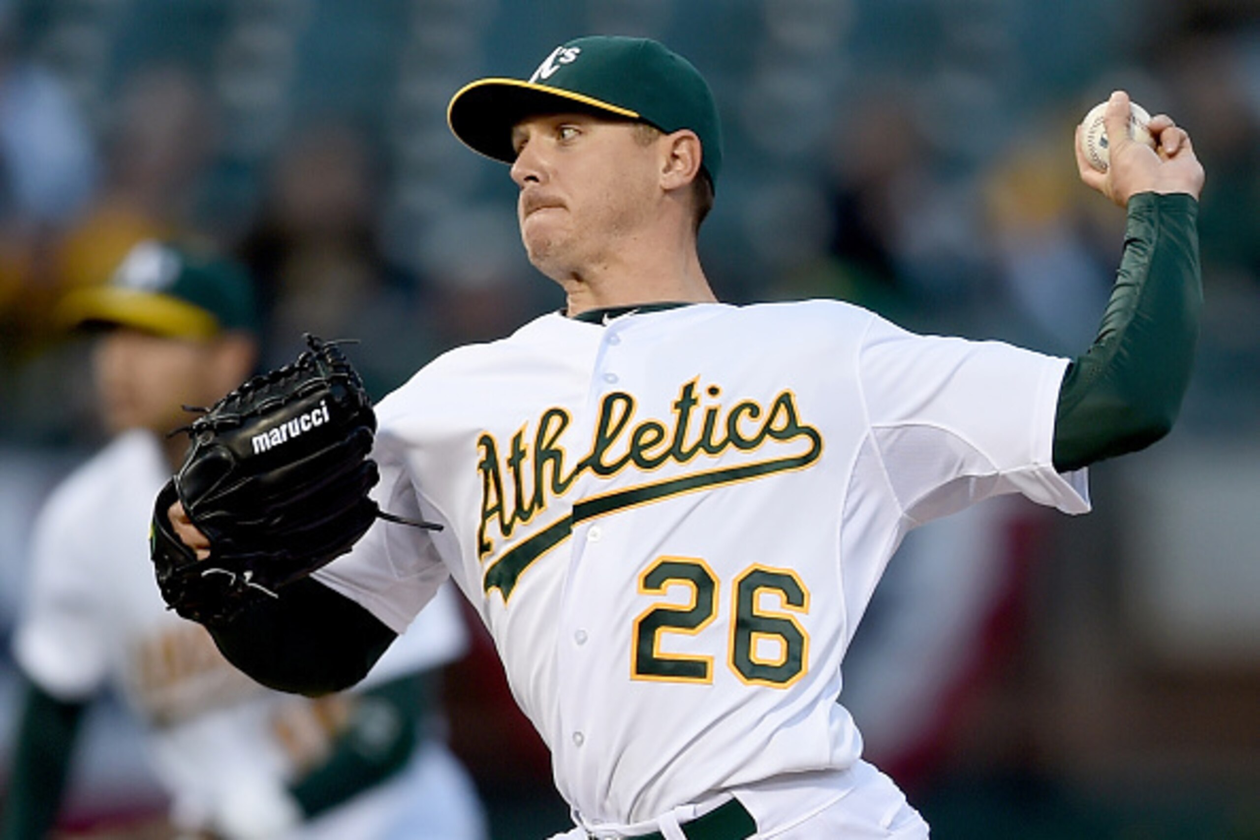 OAKLAND, CA - APRIL 08:  Scott Kazmir #26 of the Oakland Athletics pitches against the Texas Rangers in the top of the first inning at O.co Coliseum on April 8, 2015 in Oakland, California.  (Photo by Thearon W. Henderson/Getty Images)