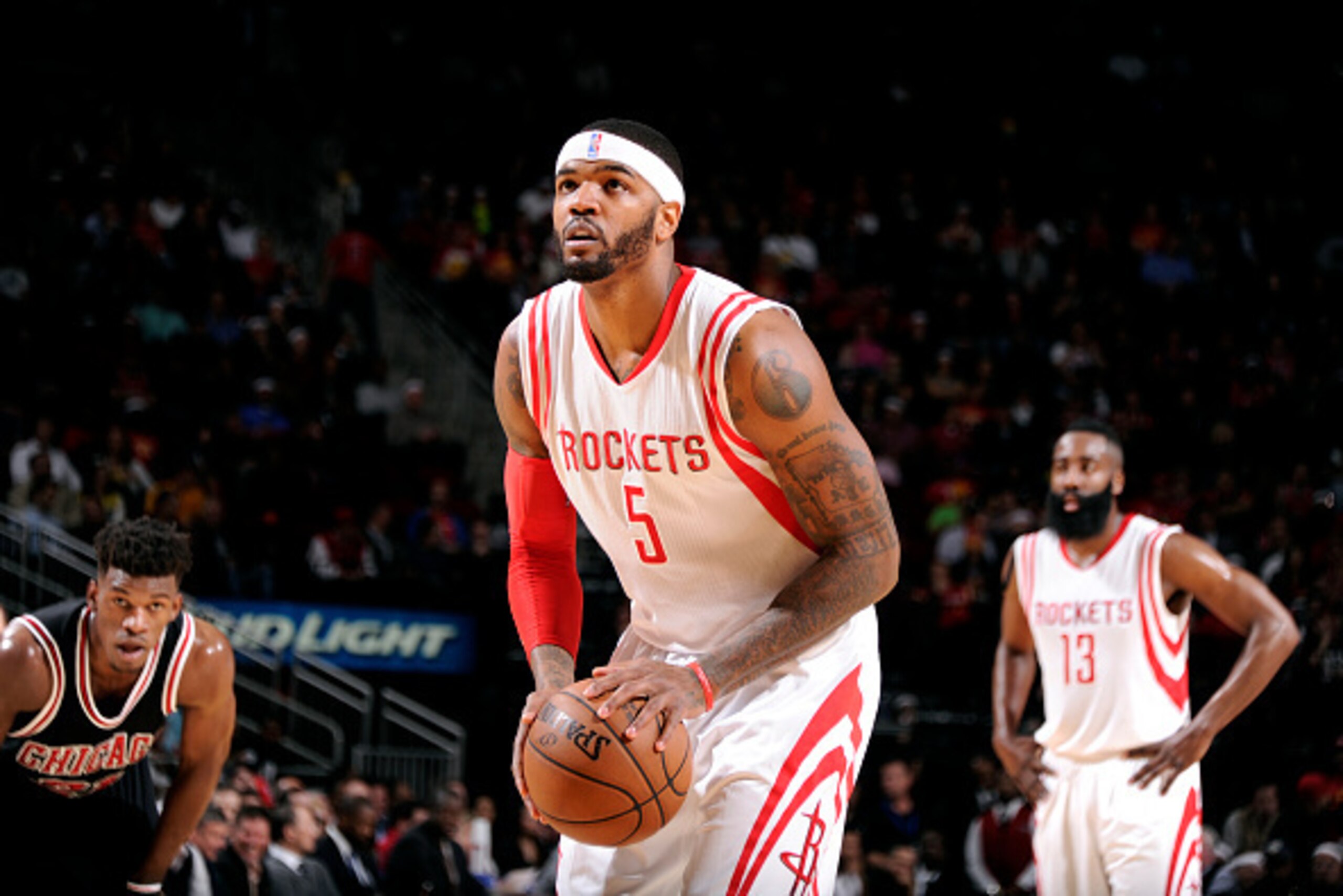 HOUSTON, TX - FEBRUARY 4: Josh Smith #5 of the Houston Rockets attempts a free throw against the Chicago Bulls on February 4, 2015 at the Toyota Center in Houston, Texas. NOTE TO USER: User expressly acknowledges and agrees that, by downloading and or usi