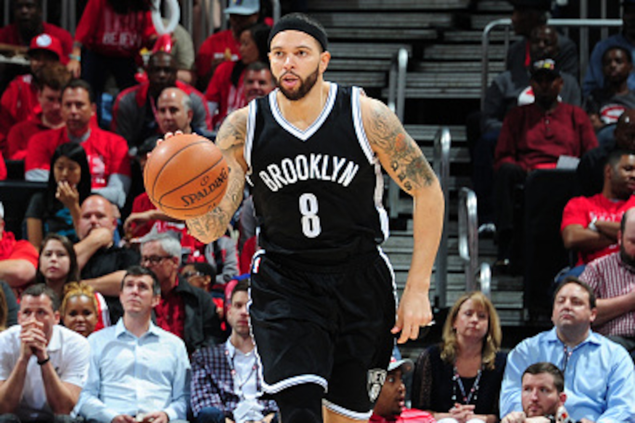 ATLANTA, GA - APRIL 29: Deron Williams #8 of the Brooklyn Nets handles the ball against the Atlanta Hawks in Game Five of the Eastern Conference Quarterfinals during the 2015 NBA Playoffs on April 29, 2015 at Philips Arena in Atlanta, Georgia. NOTE TO U ATLANTA, GA - APRIL 29: Deron Williams #8 of the Brooklyn Nets handles the ball against the Atlanta Hawks in Game Five of the Eastern Conference Quarterfinals during the 2015 NBA Playoffs on April 29, 2015 at Philips Arena in Atlanta, Georgia. NOTE TO U