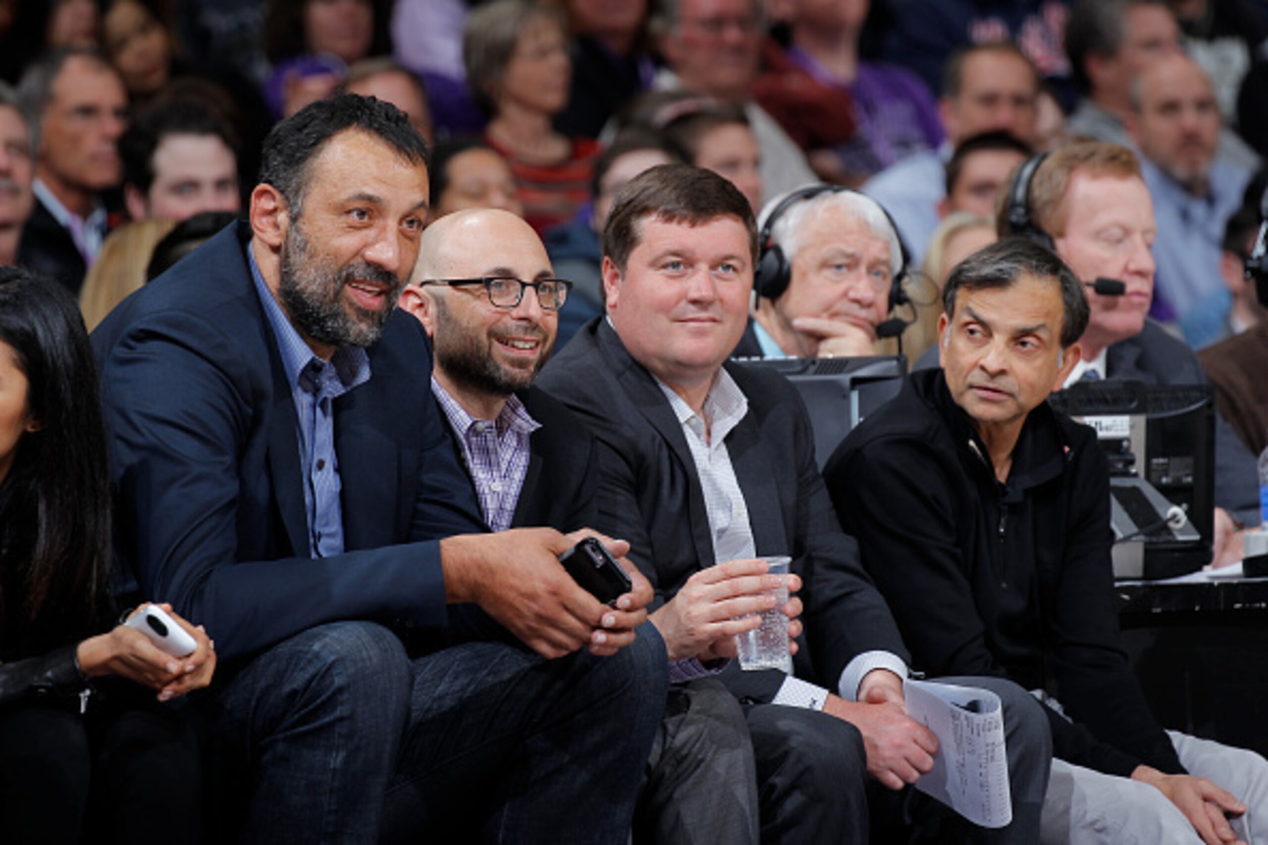 SACRAMENTO, CA - APRIL 7: Vice president Vlade Divac, General Manager Pete D'Alessandro and Owner Vivek Ranadivé of the Sacramento Kings look on during the game against the Minnesota Timberwolves on April 7, 2015 at Sleep Train Arena in Sacramento, Califo