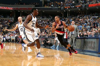 MEMPHIS, TN - APRIL 29: C.J. McCollum #3 of the Portland Trail Blazers drives against Jeff Green #32 of the Memphis Grizzlies in Game Five of the Western Conference Quarterfinals of the NBA Playoffs at FedExForum on April 29, 2015 in Memphis, Tennessee. N