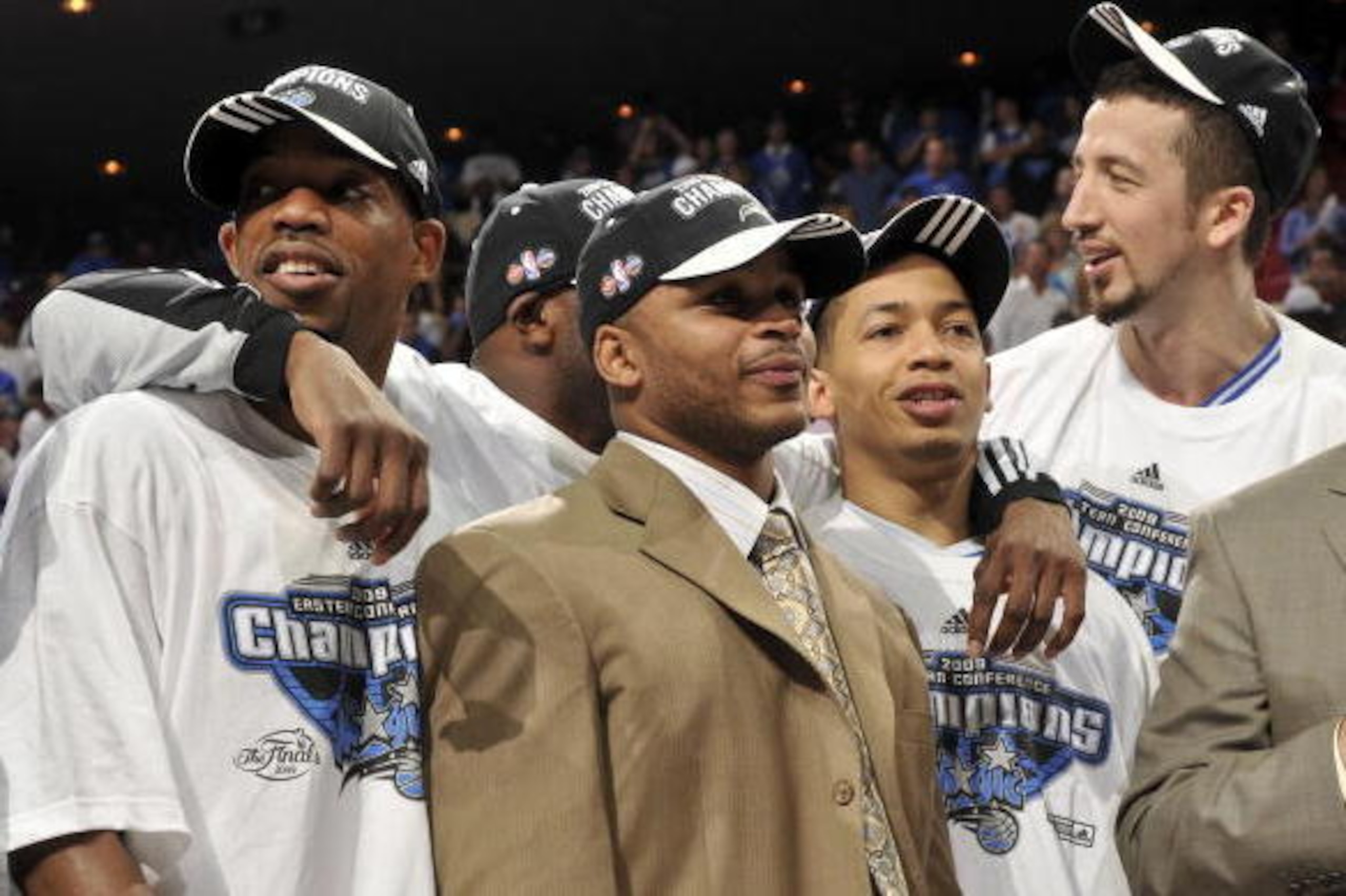 ORLANDO - MAY 30:  Rafer Alston #1, Jameer Nelson, Tyronn Lue #10 and Hedo Turkoglu #15 celebrate after the Orlando Magic defeated the Cleveland Cavaliers 103-90 in Game Six of the Eastern Conference Finals during the 2009 NBA Playoffs at Amway Arena on M