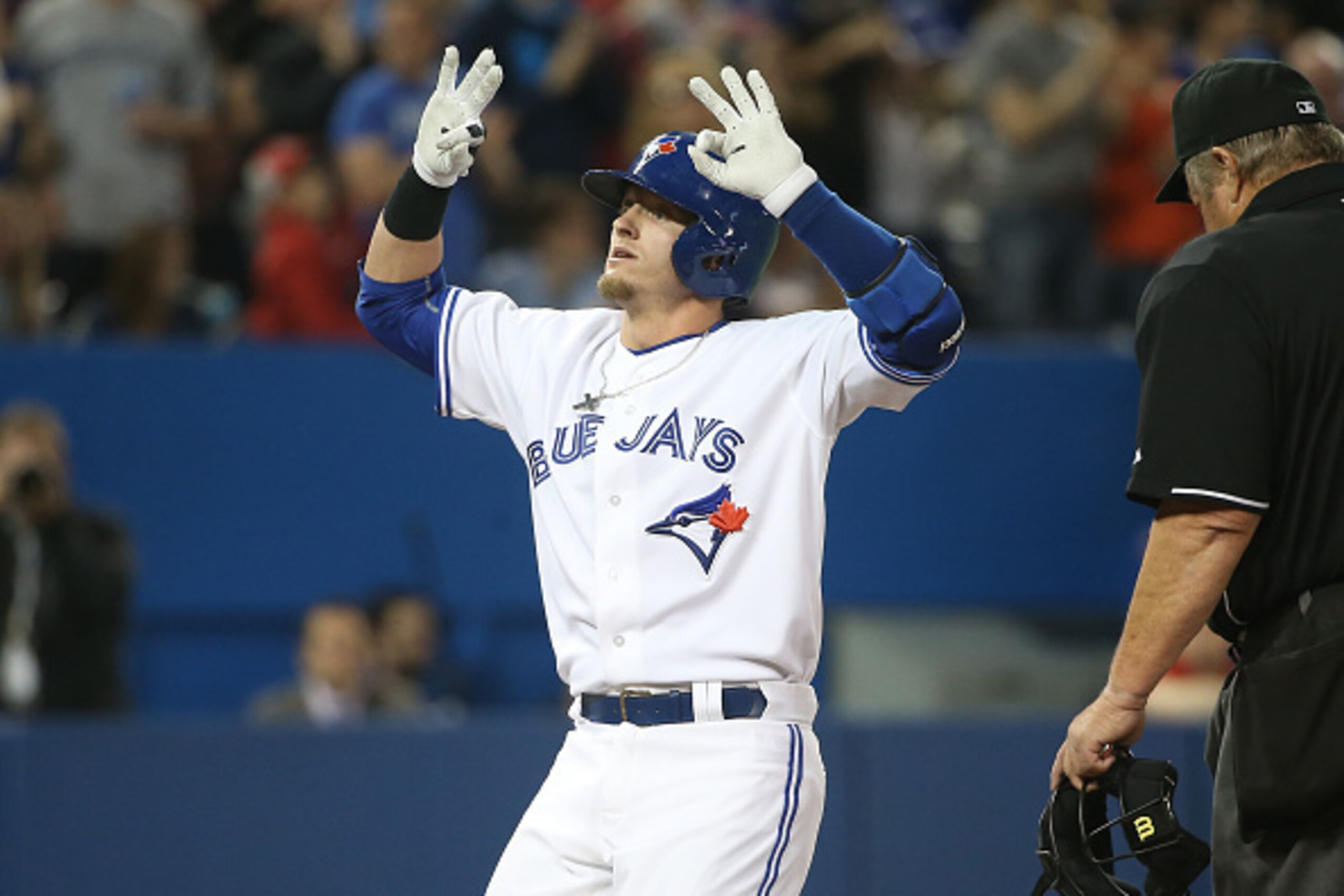 TORONTO, CANADA - APRIL 17: Josh Donaldson #20 of the Toronto Blue Jays celebrates his two-run home run in the third inning during MLB game action against the Atlanta Braves on April 17, 2015 at Rogers Centre in Toronto, Ontario, Canada. (Photo by Tom Szc
