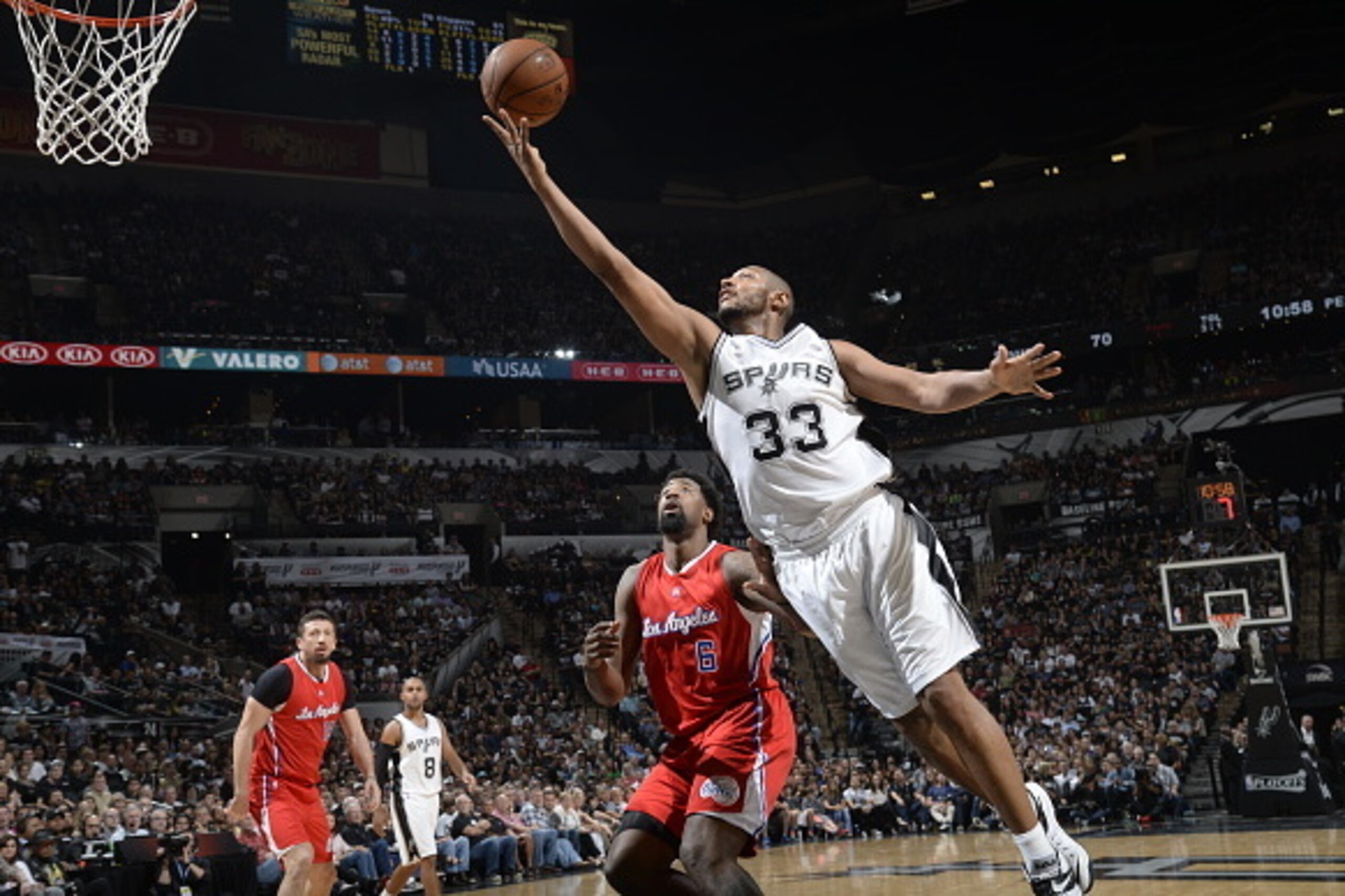 SAN ANTONIO, TEXAS - April 24: Boris Diaw #33 of the San Antonio Spurs goes for the layup against the Los Angeles Clippers during Game Three of the Western Conference Quarterfinals during the NBA Playoffs on April 24, 2015 at AT&T Center in San Antonio, T SAN ANTONIO, TEXAS - April 24: Boris Diaw #33 of the San Antonio Spurs goes for the layup against the Los Angeles Clippers during Game Three of the Western Conference Quarterfinals during the NBA Playoffs on April 24, 2015 at AT&T Center in San Antonio, T