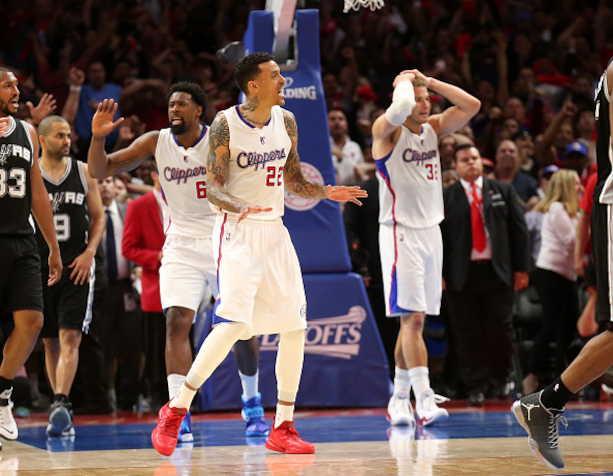 LOS ANGELES, CA - APRIL 28:  Matt Barnes #22, DeAndre Jordan #6, and Blake Griffin #32 of the Los Angeles Clippers react after Jordan was called for offensive basket interference late in the game against the San Antonio Spurs during Game Five of the Weste